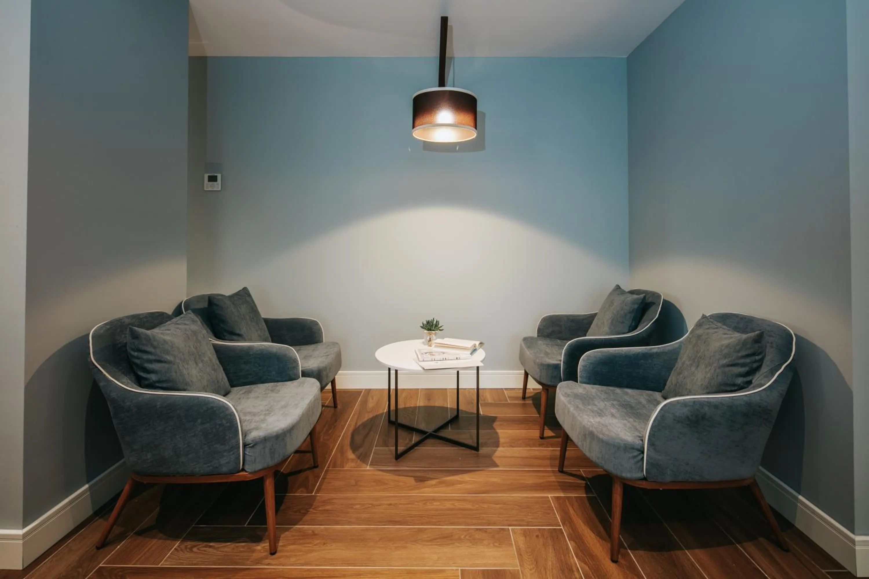 Communal lounge/ TV room in Aparthotel Touring