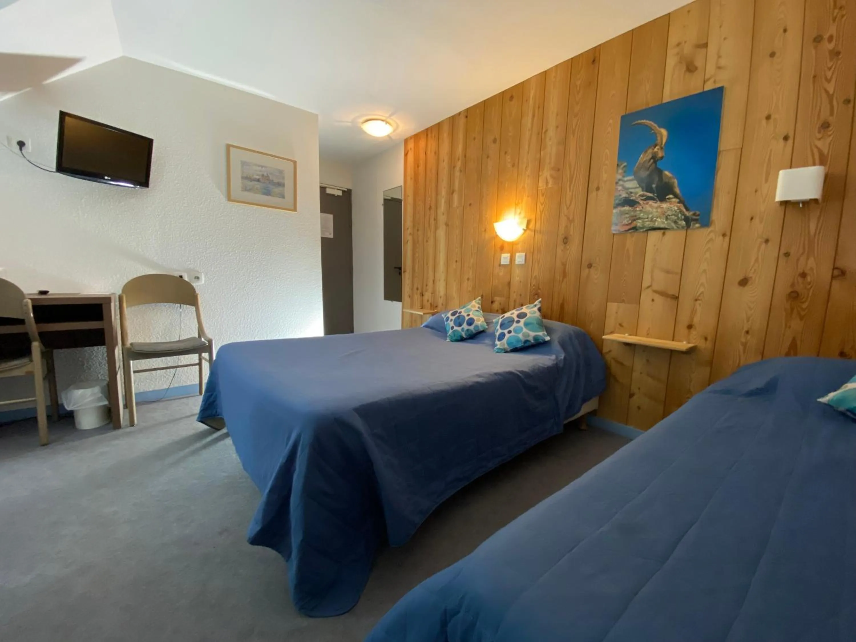 Bed in HOTEL DE LA GARE