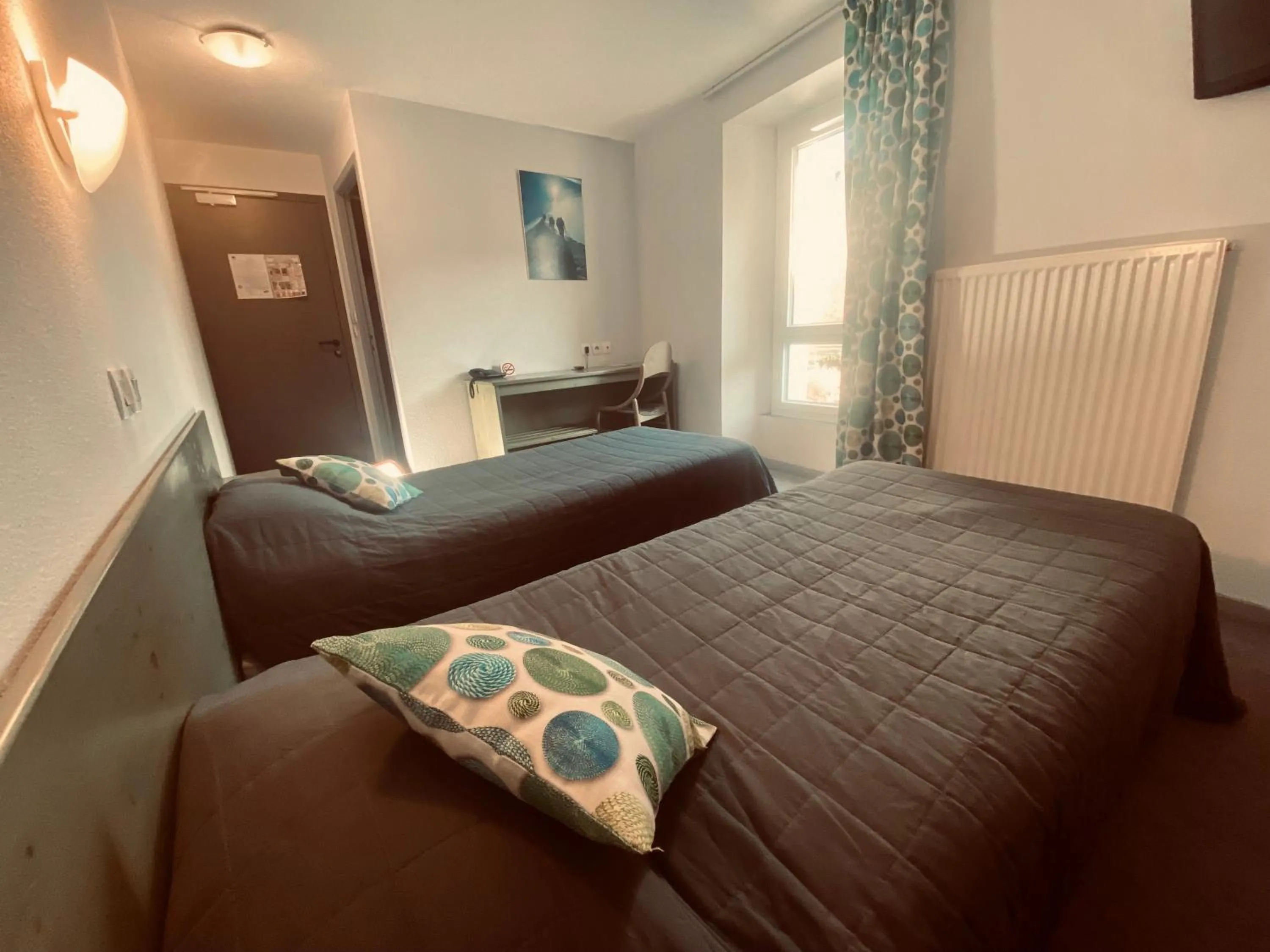 Bed in HOTEL DE LA GARE