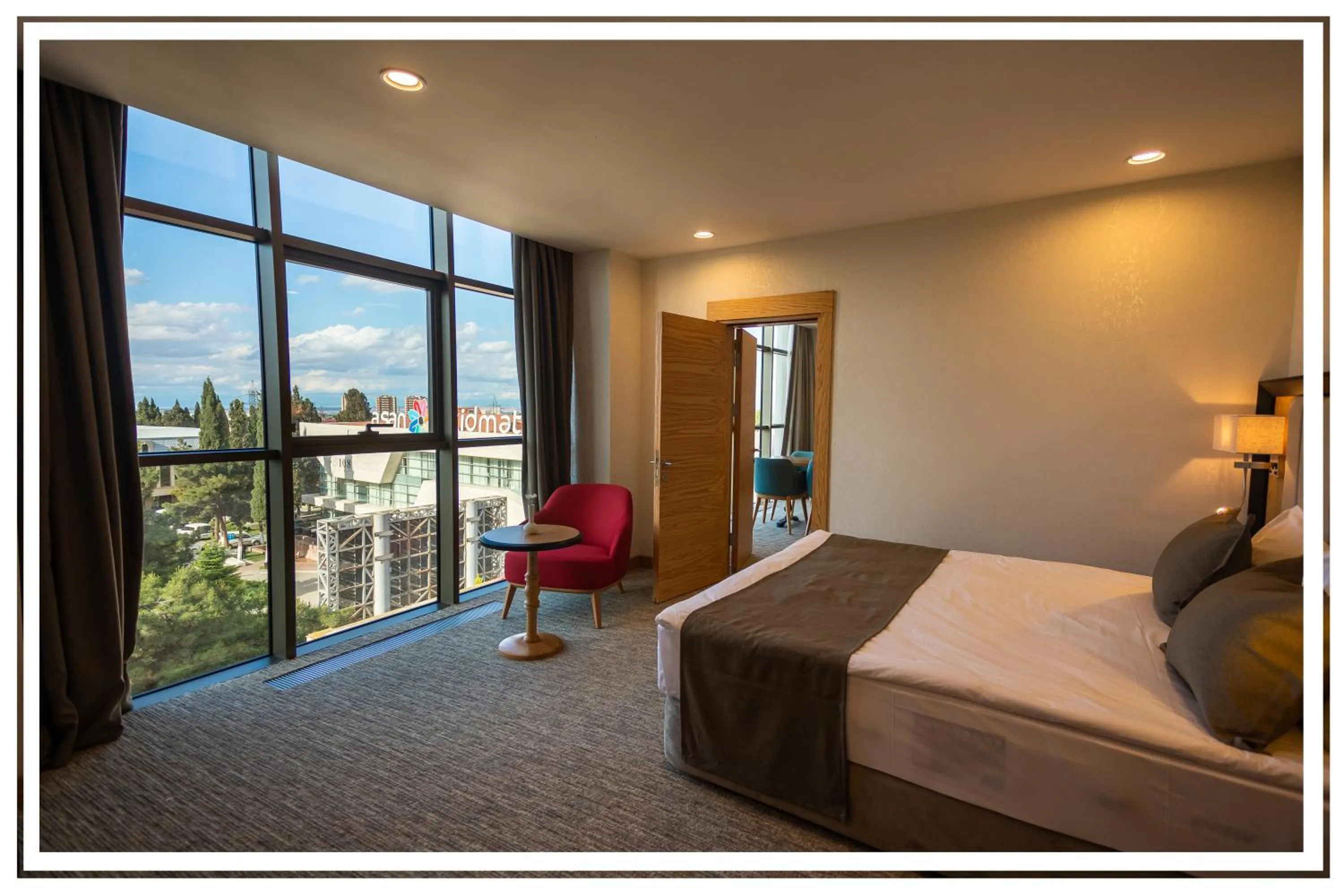 Seating area, Bed in Premium Hotel Ganja