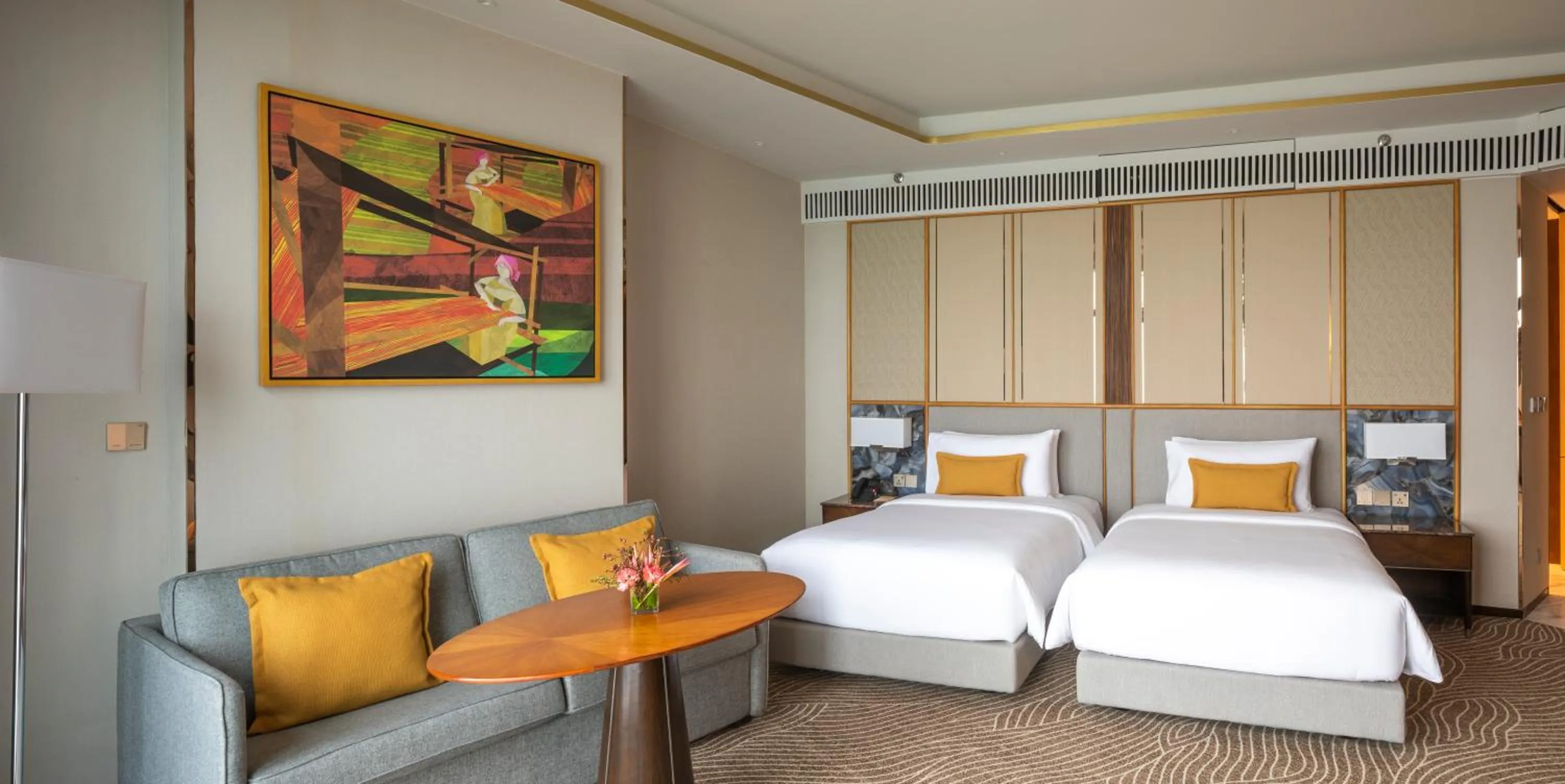 Bed in Fili Hotel at Nustar Cebu