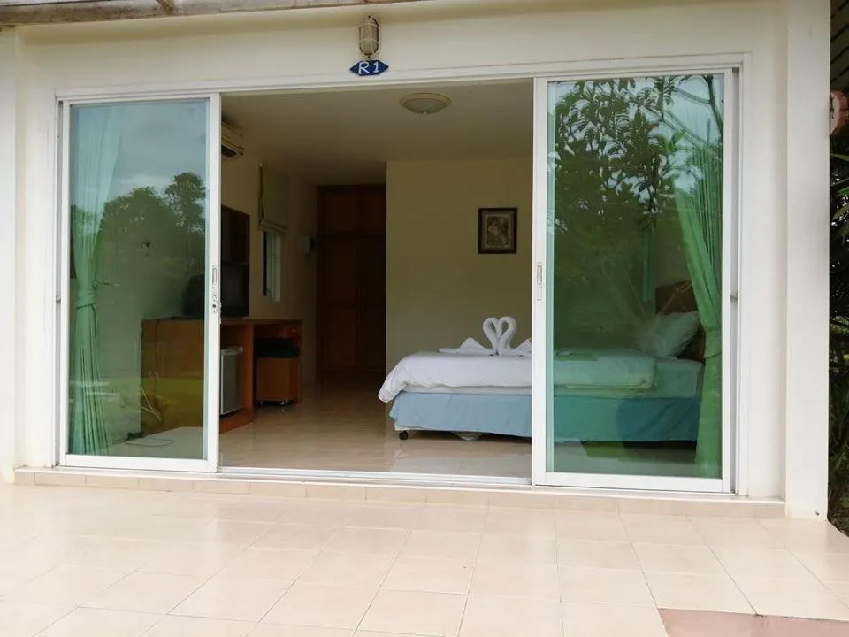 Bed in Vimannam Resort