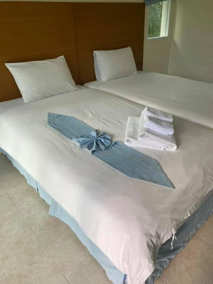 Bed in Vimannam Resort
