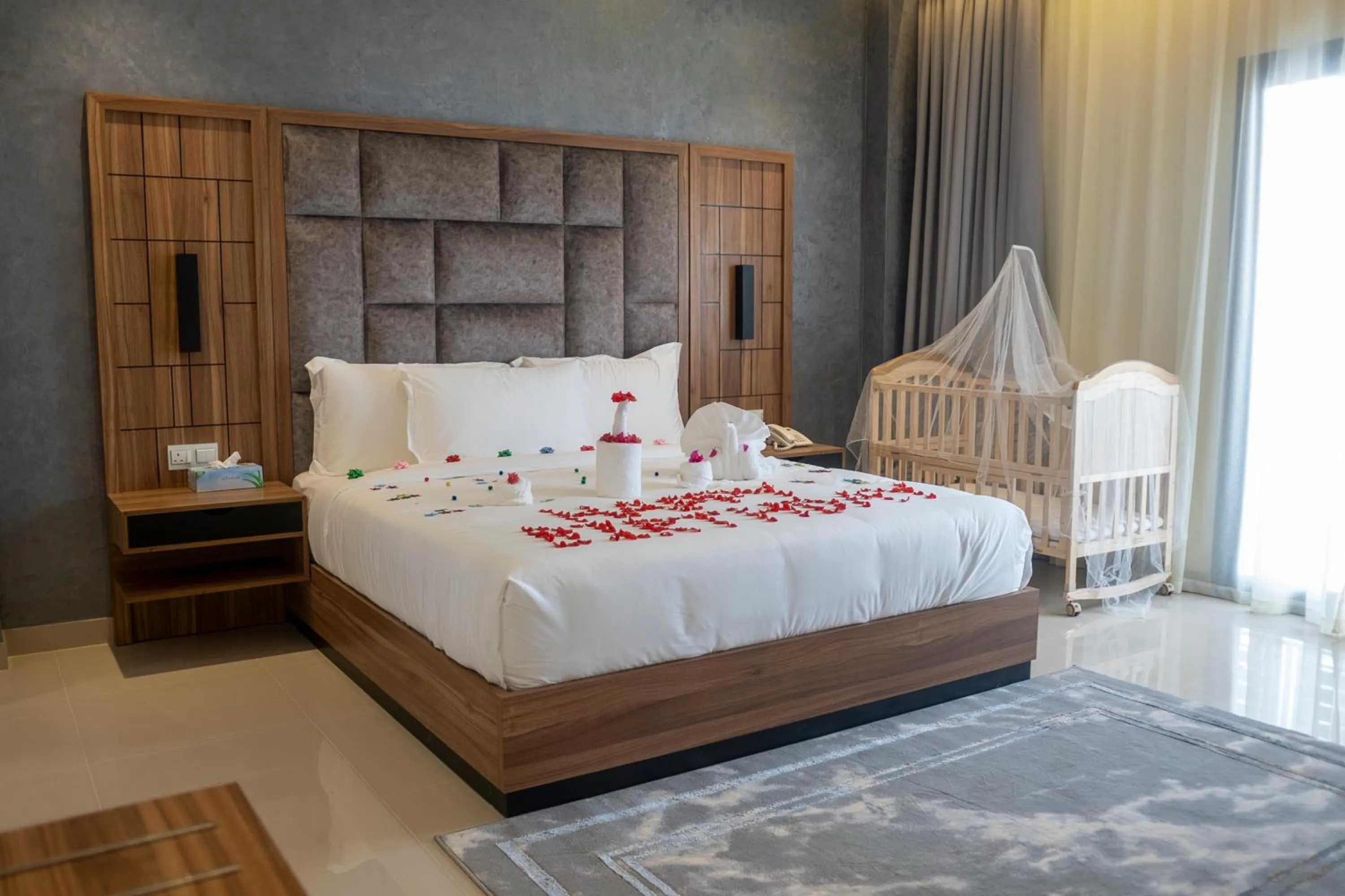 Bed in The Plaza Hotel & Resort