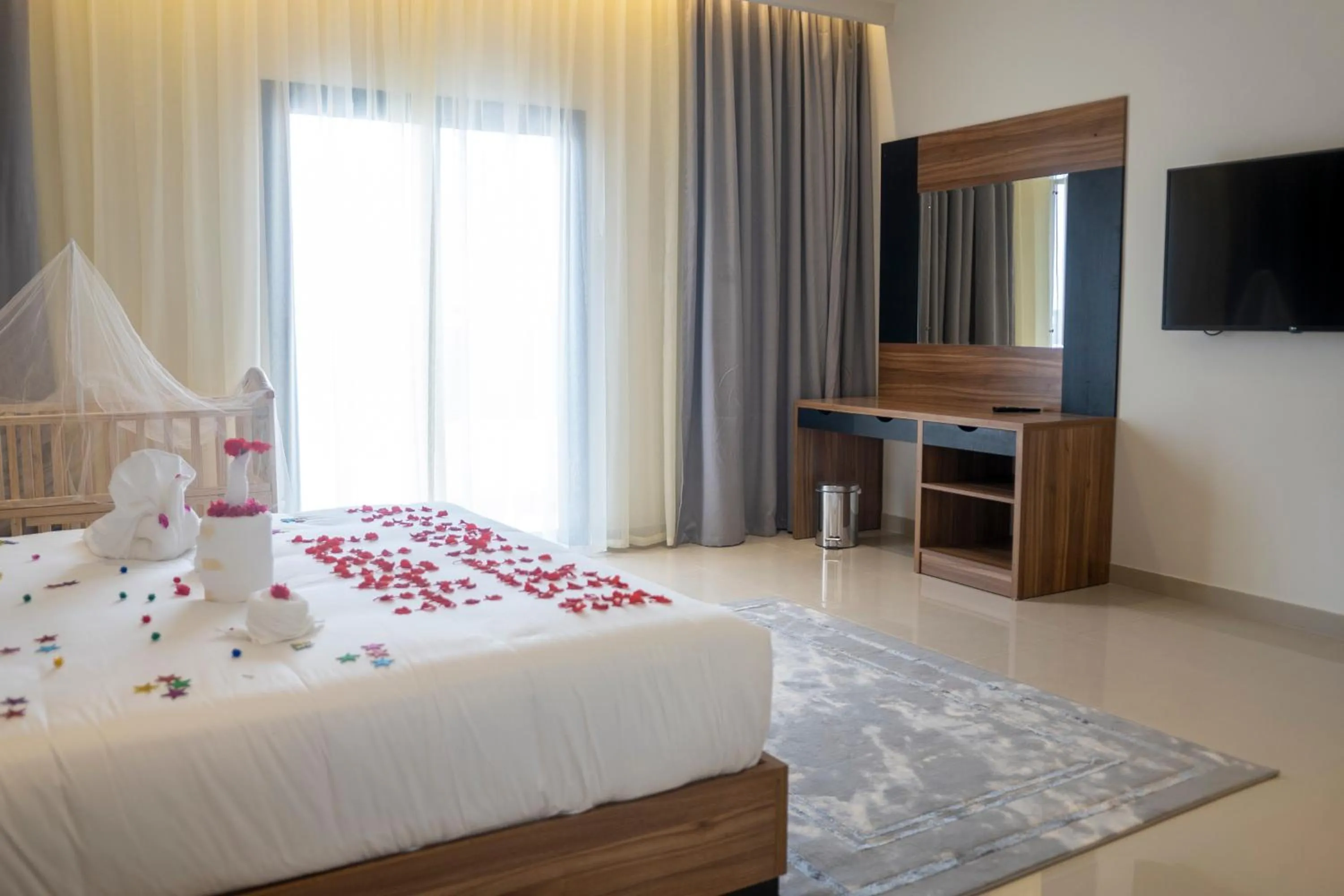 Bed in The Plaza Hotel & Resort