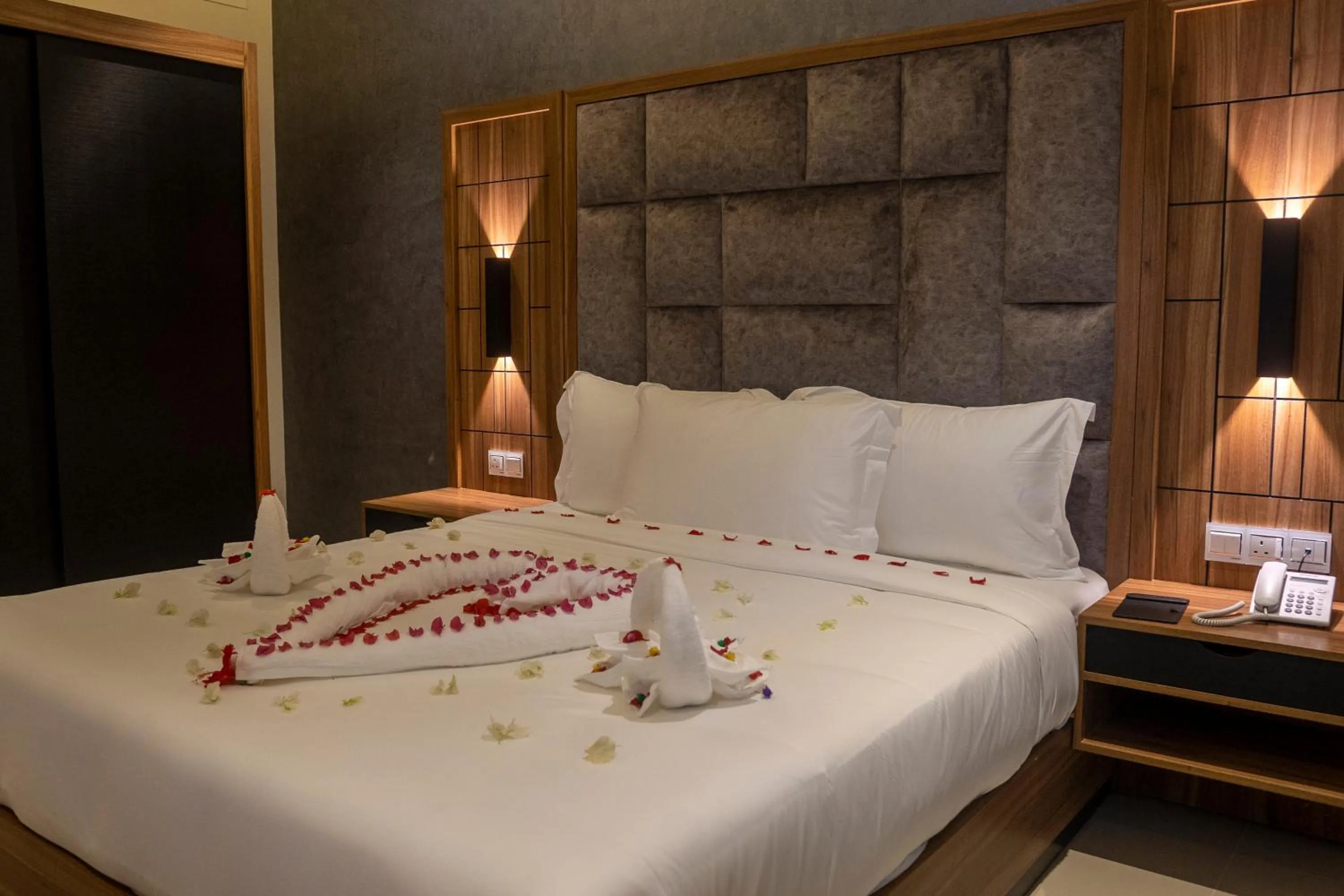 Bed in The Plaza Hotel & Resort