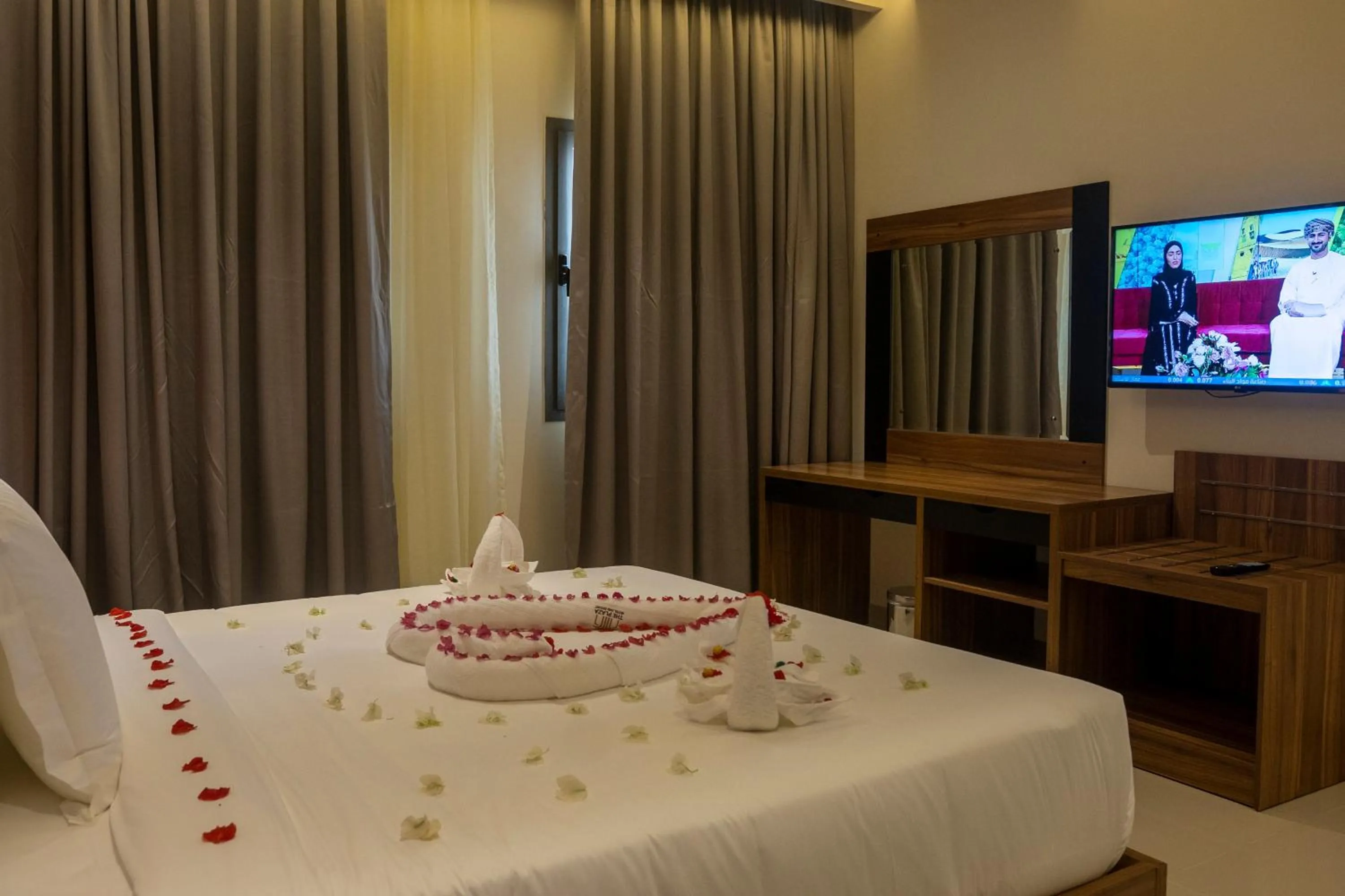 Bed in The Plaza Hotel & Resort