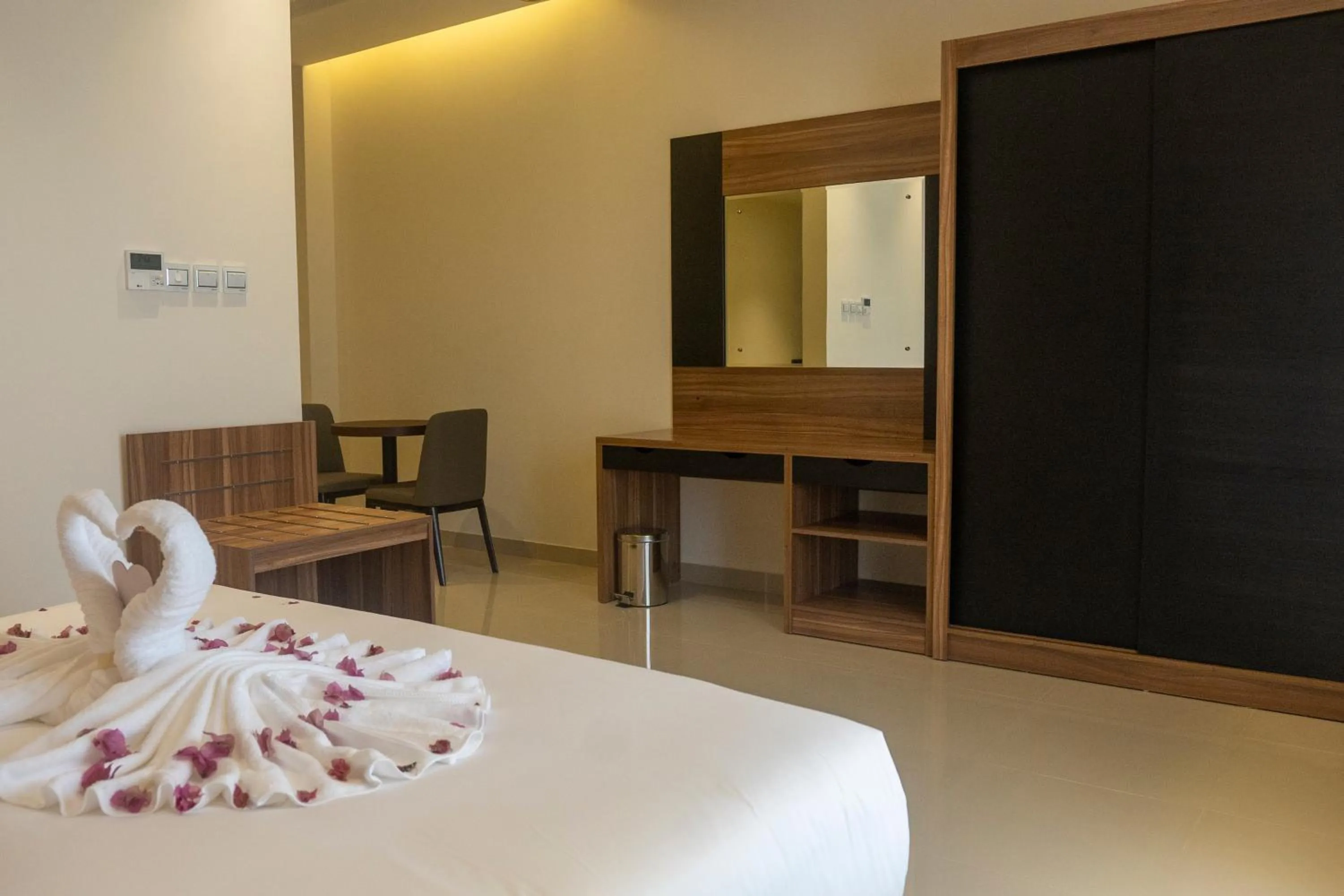 Bed in The Plaza Hotel & Resort