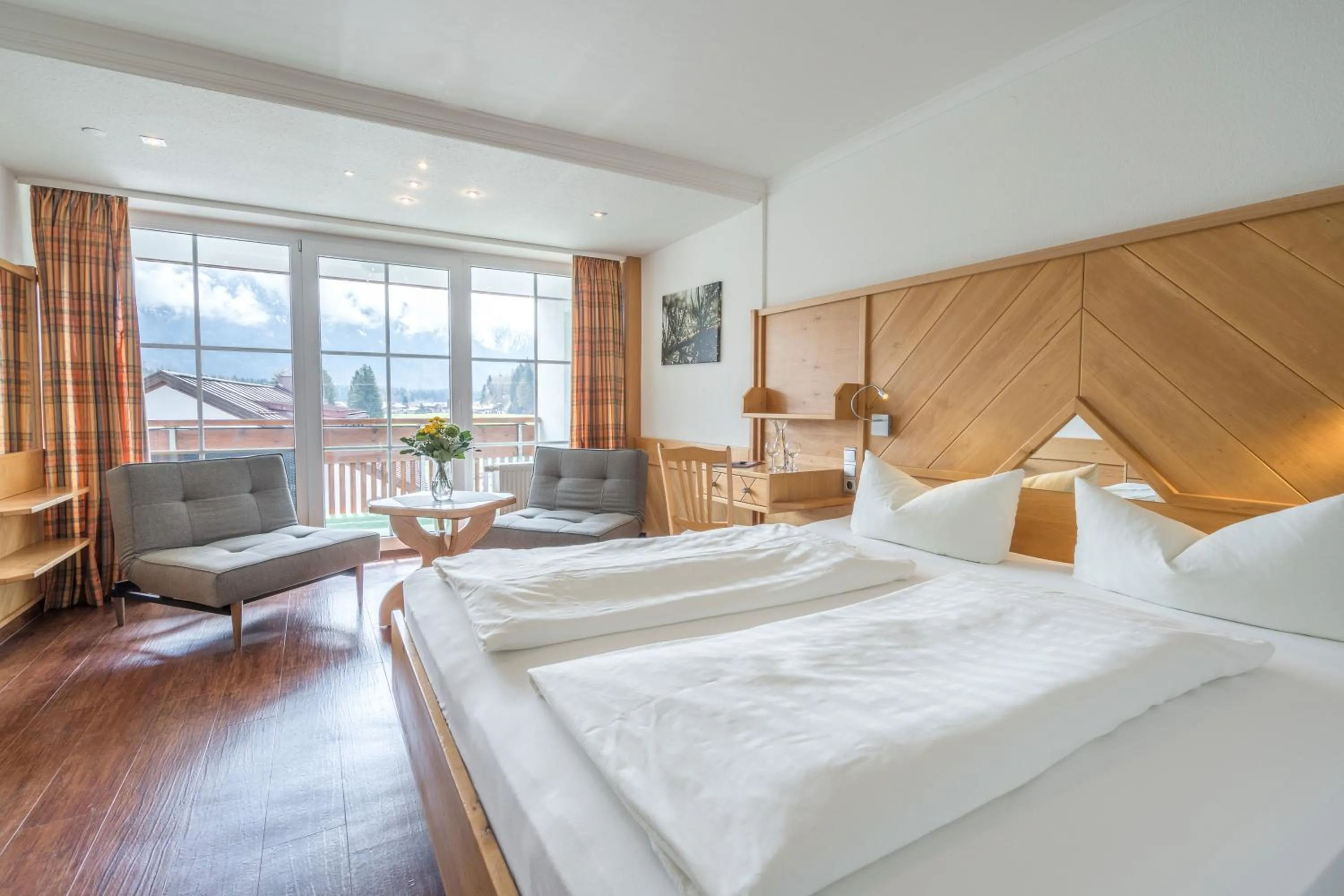 Photo of the whole room, Bed in Wohlfühlhotel Frohsinn