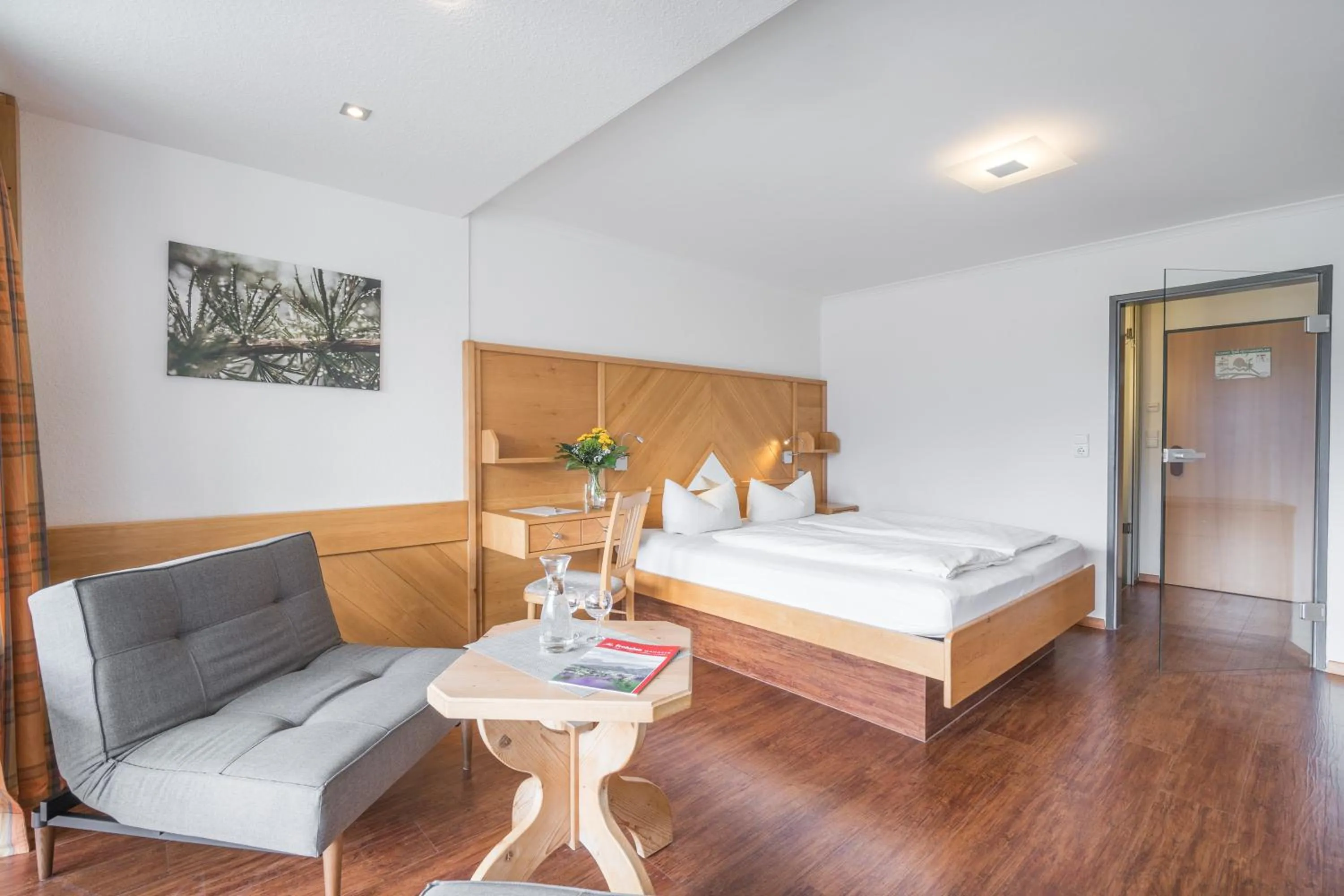 Photo of the whole room, Bed in Wohlfühlhotel Frohsinn