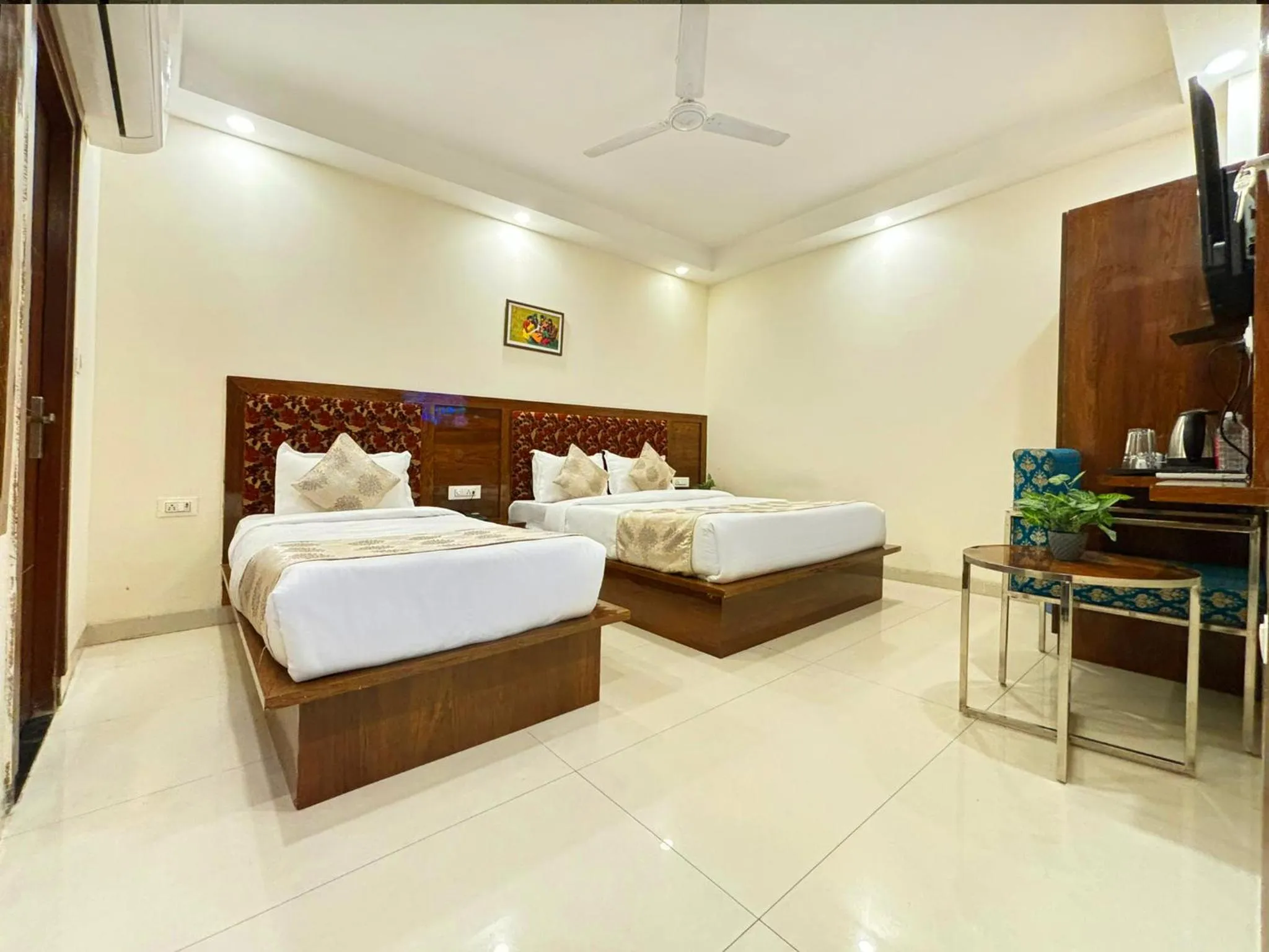 Photo of the whole room, Bed in Hotel Emblem Suites Delhi Airport - Free Airport Pickup or Drop
