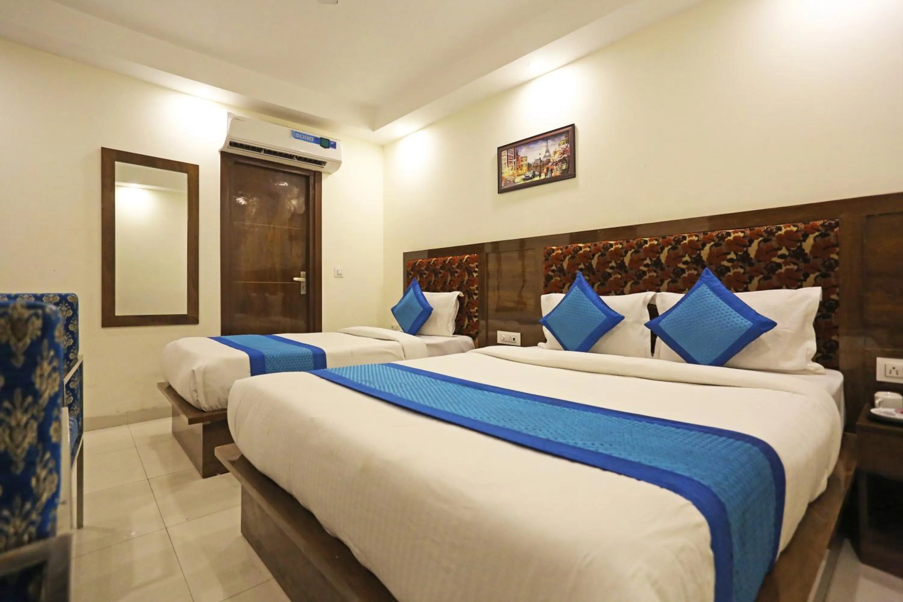 Bedroom, Bed in Hotel Emblem Suites Delhi Airport - Free Airport Pickup or Drop