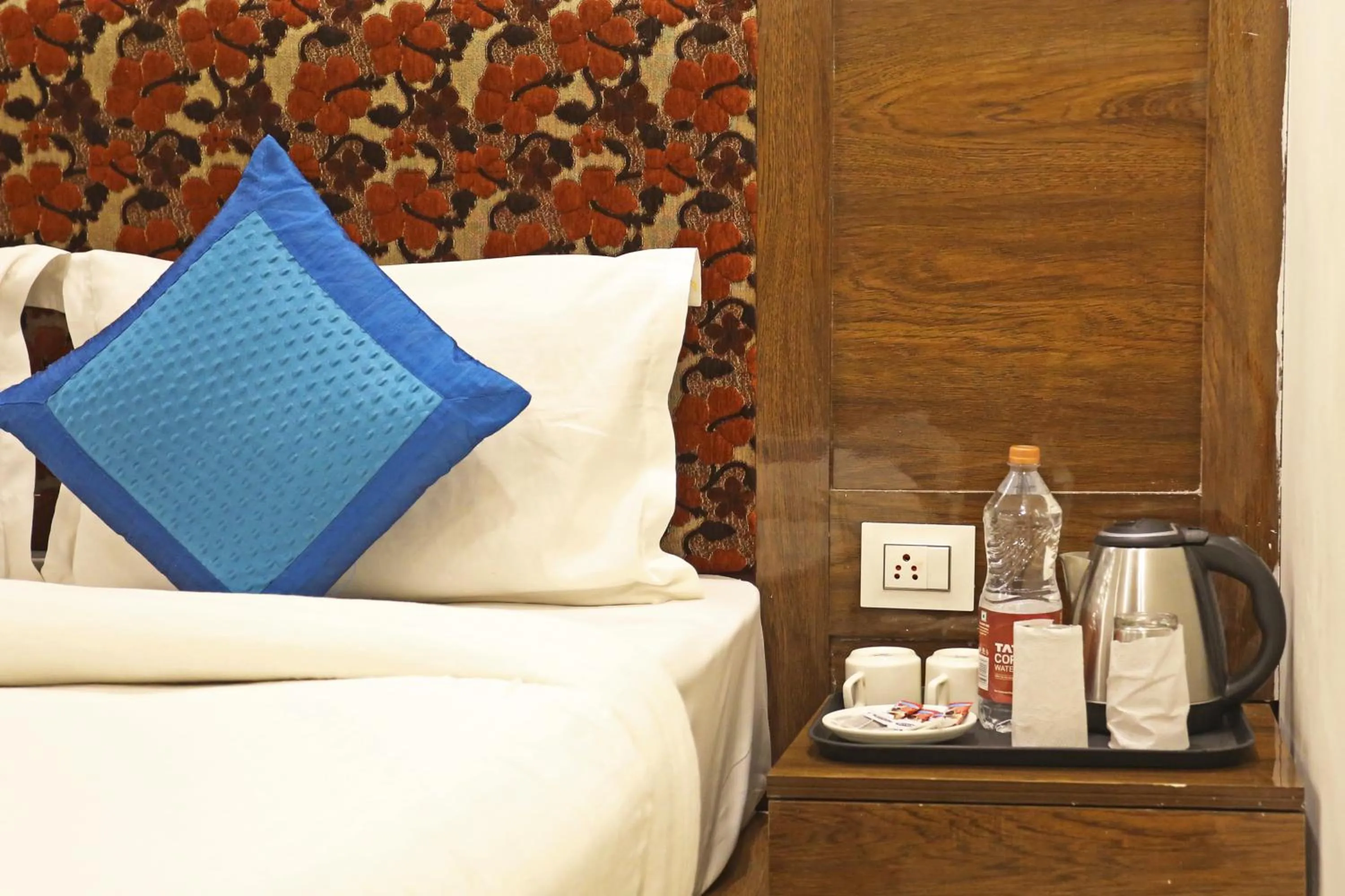 Coffee/tea facilities, Bed in Hotel Emblem Suites Delhi Airport - Free Airport Pickup or Drop