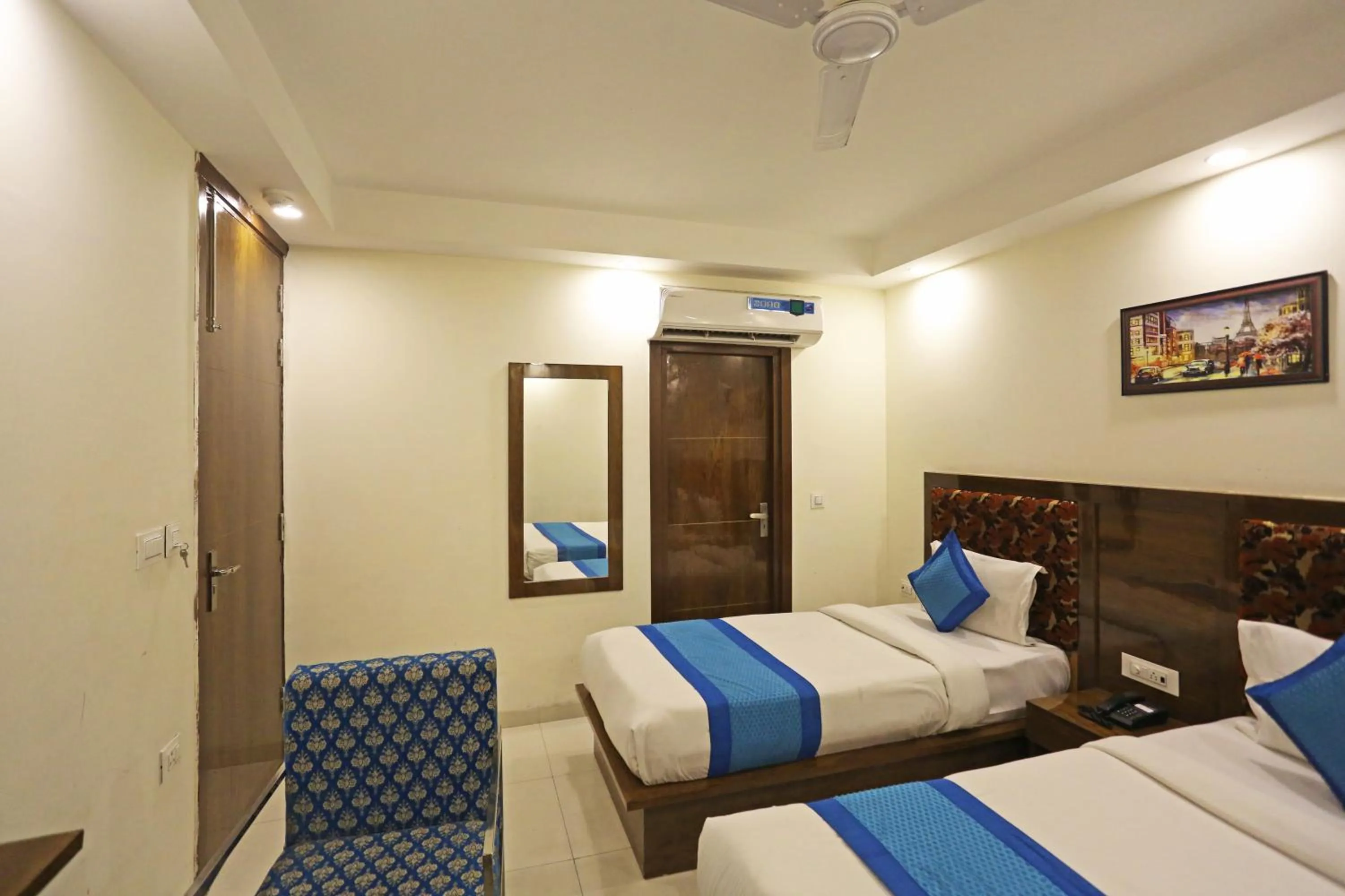 Photo of the whole room, Bed in Hotel Emblem Suites Delhi Airport - Free Airport Pickup or Drop