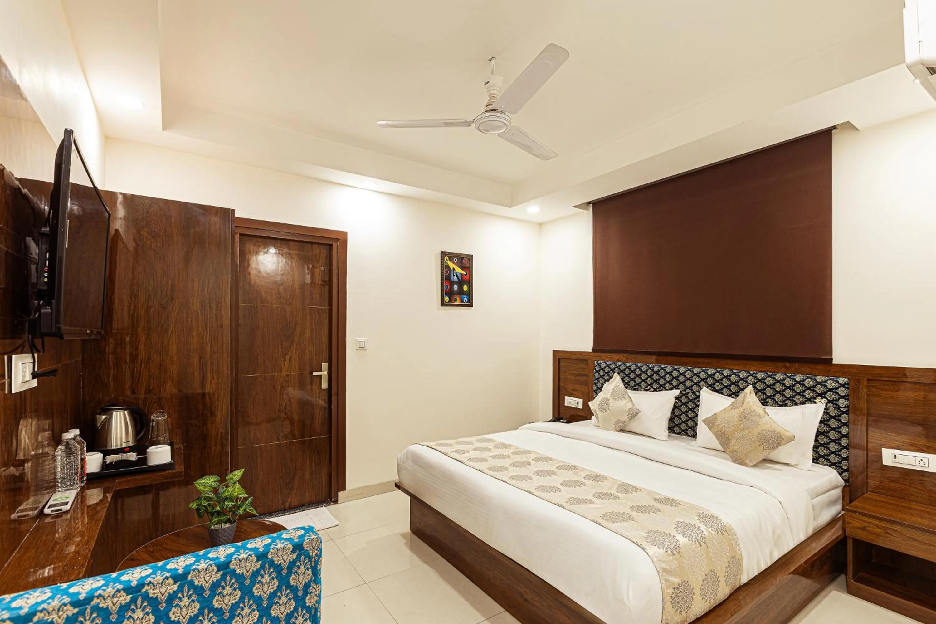 Photo of the whole room, Bed in Hotel Emblem Suites Delhi Airport - Free Airport Pickup or Drop