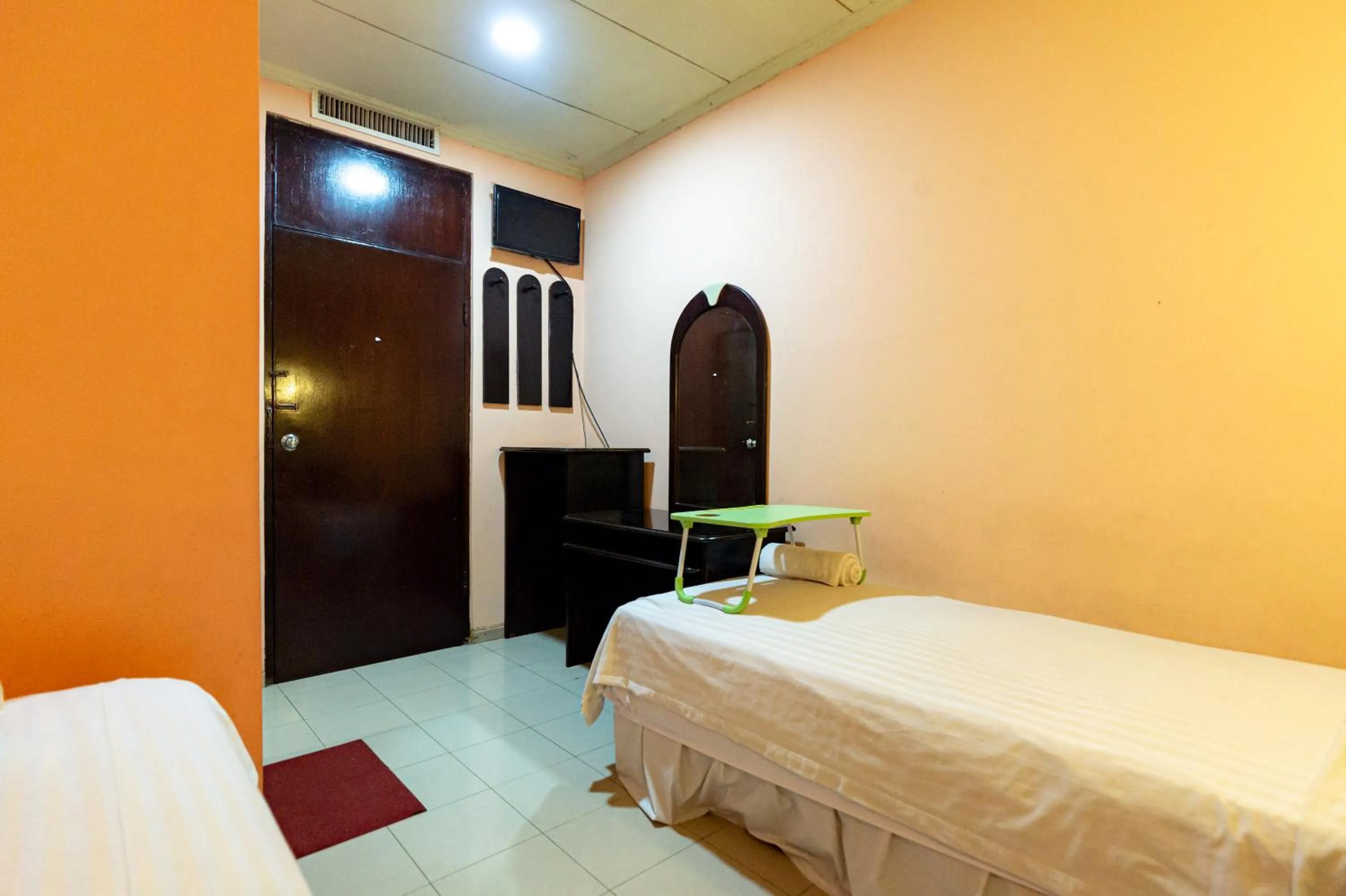 Bed in Urbanview Hotel P Residence Asemka
