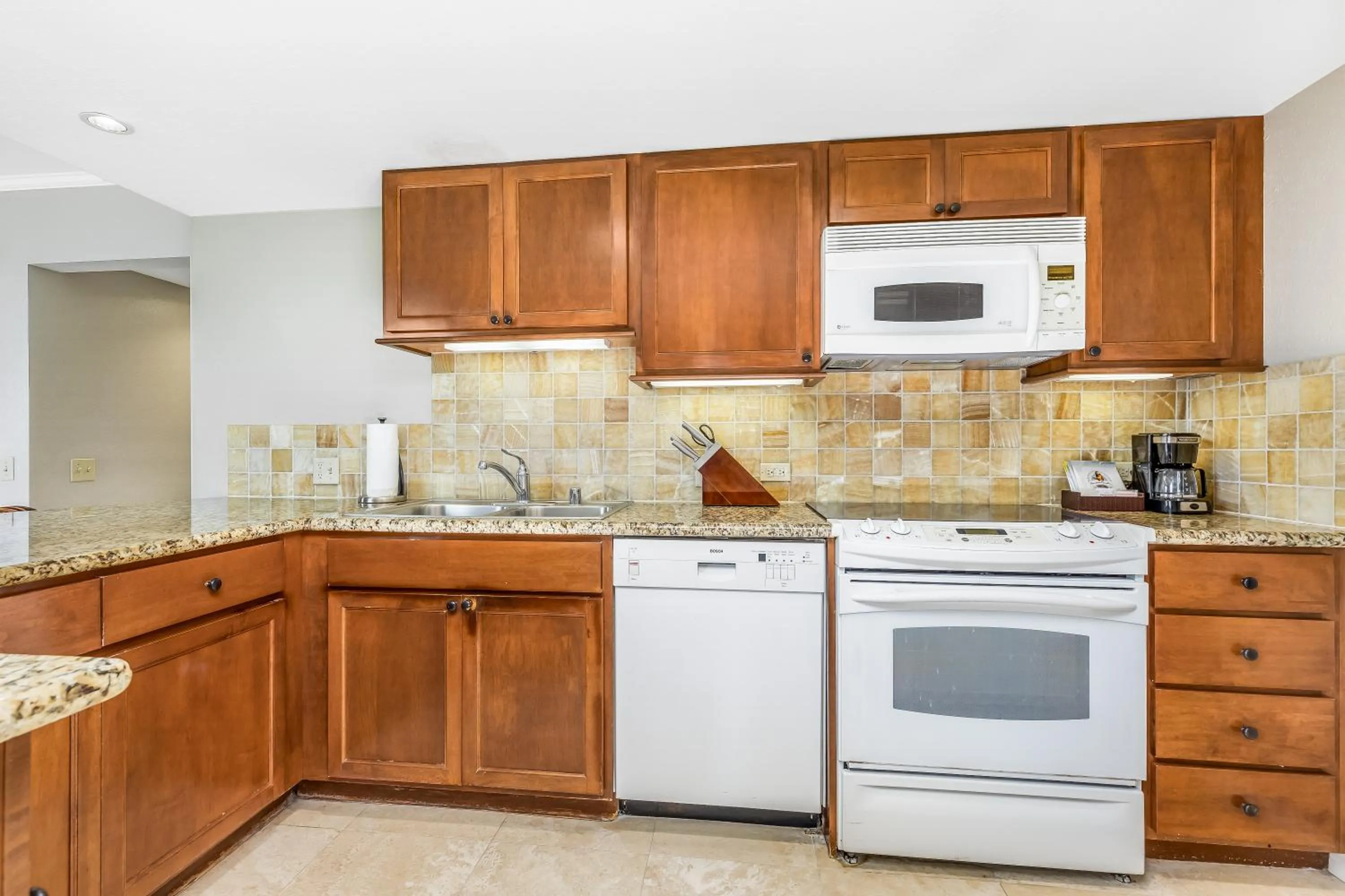 Kitchen or kitchenette in Luana Waikiki Hotel & Suites