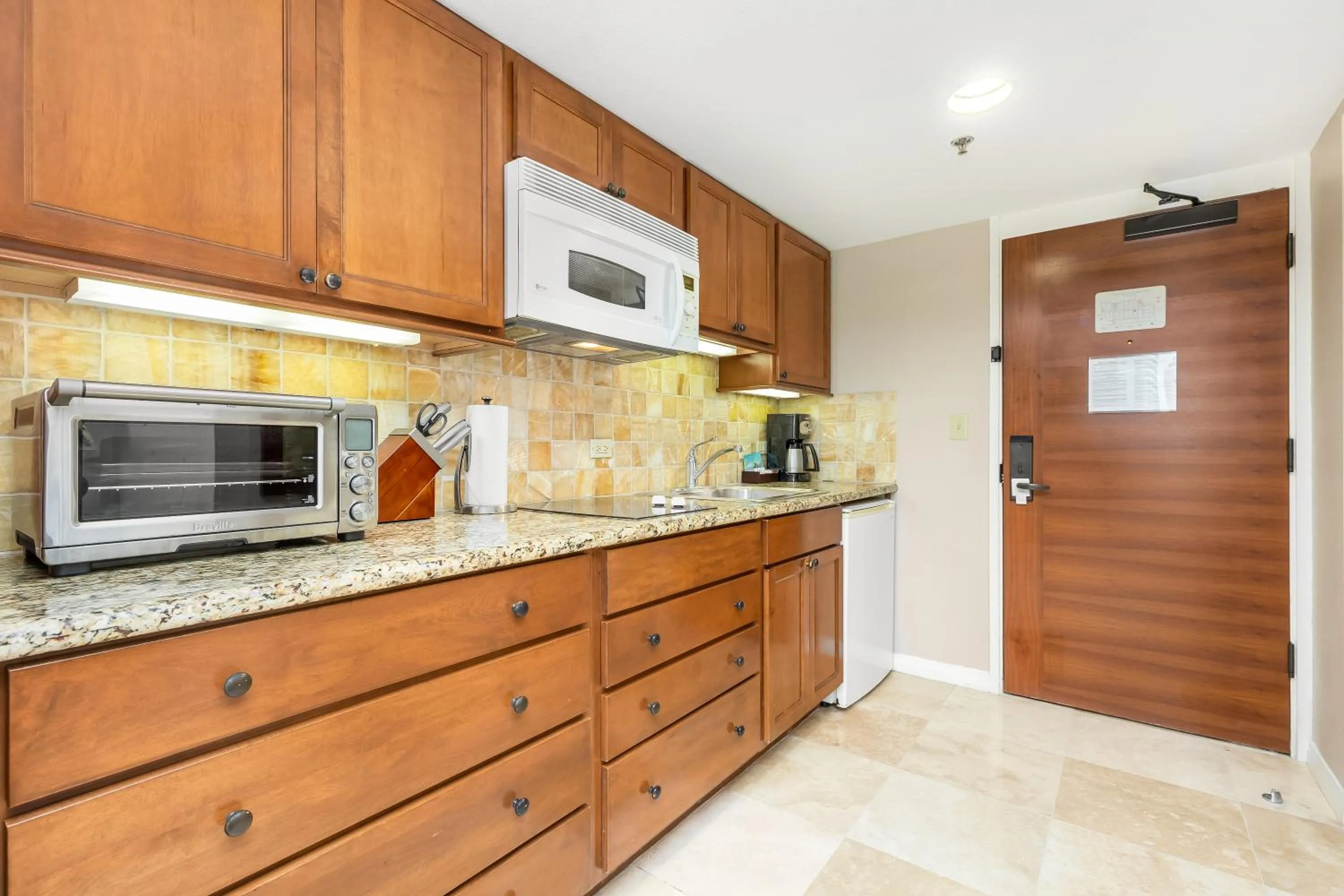 Kitchen or kitchenette in Luana Waikiki Hotel & Suites