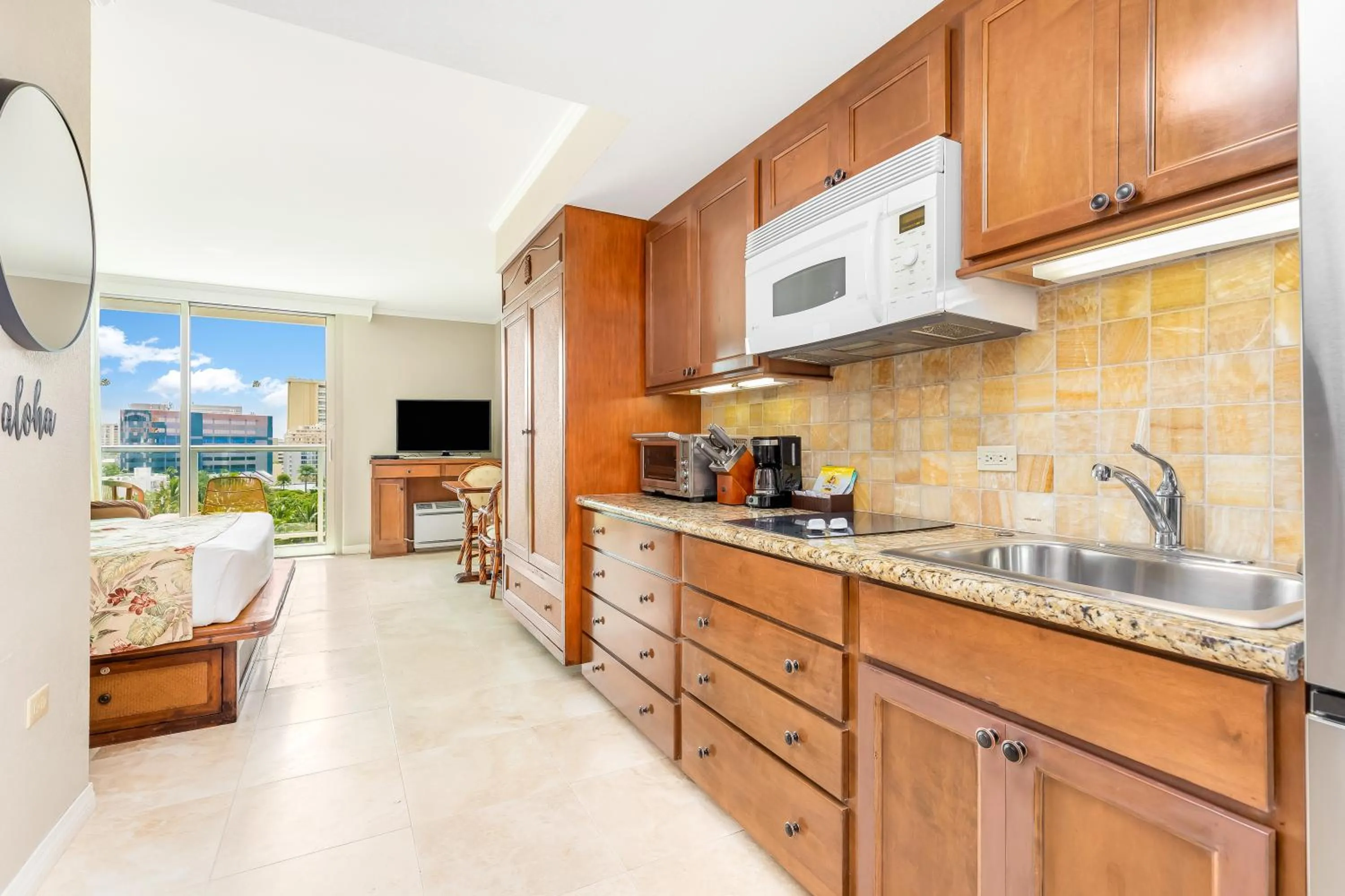Kitchen or kitchenette in Luana Waikiki Hotel & Suites