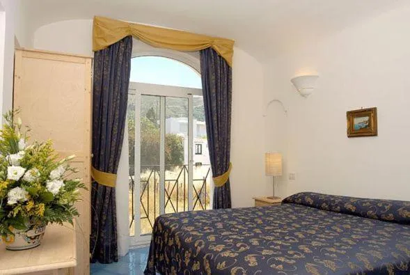 Bed in Hotel Bussola