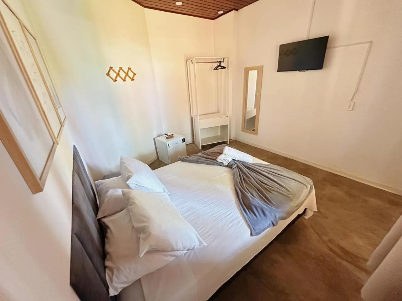 Bed in Pousada Ponta dos Corais