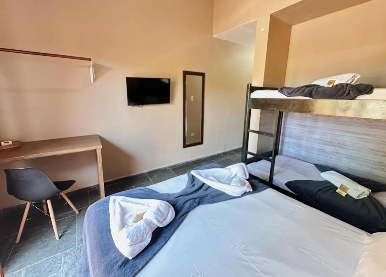 Bed in Pousada Ponta dos Corais