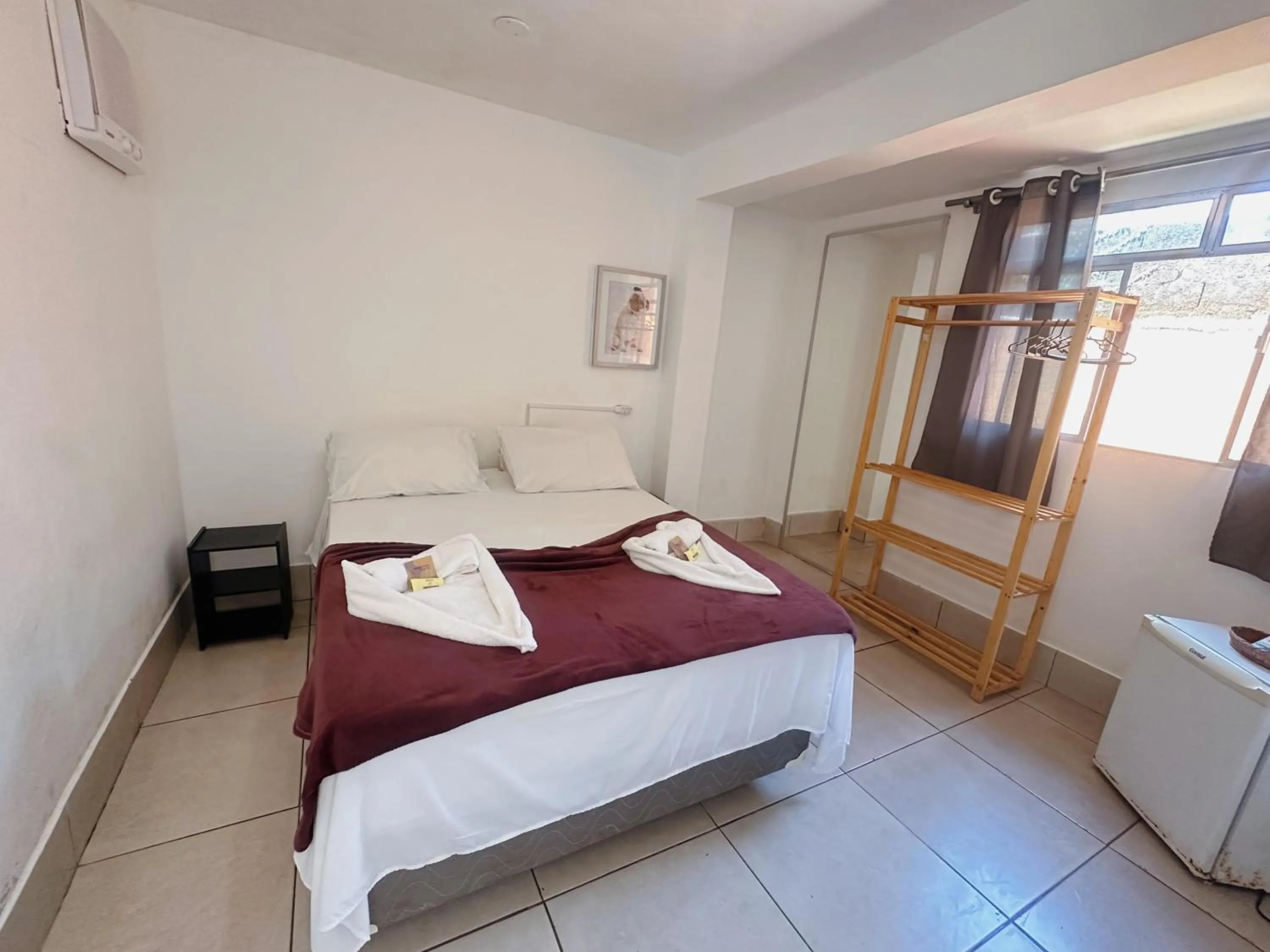 Bed in Pousada Ponta dos Corais