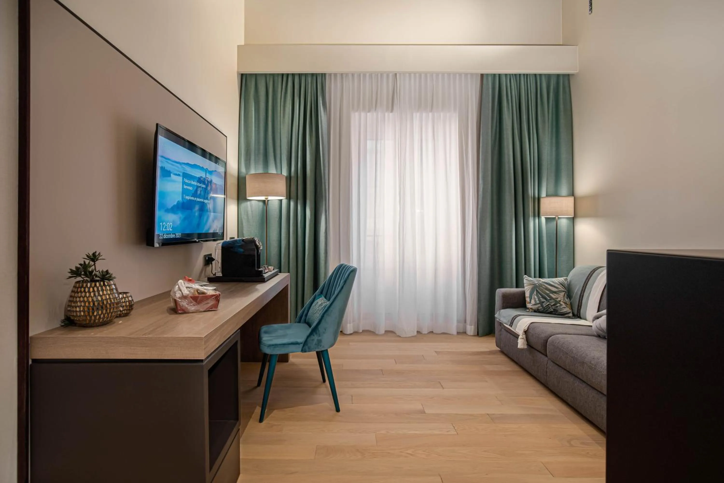 Seating area, Bed in PALAZZO UBERTINI Urban Suites