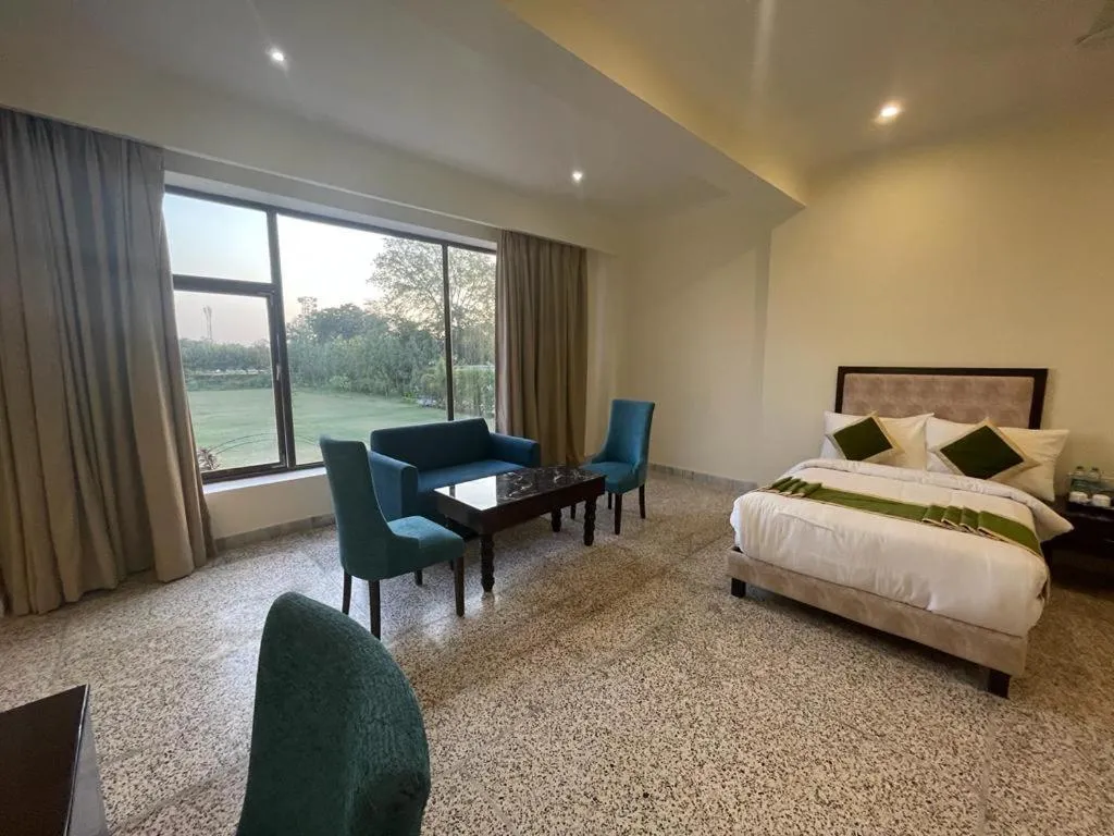 Bed in Gautam Hotels & Resorts