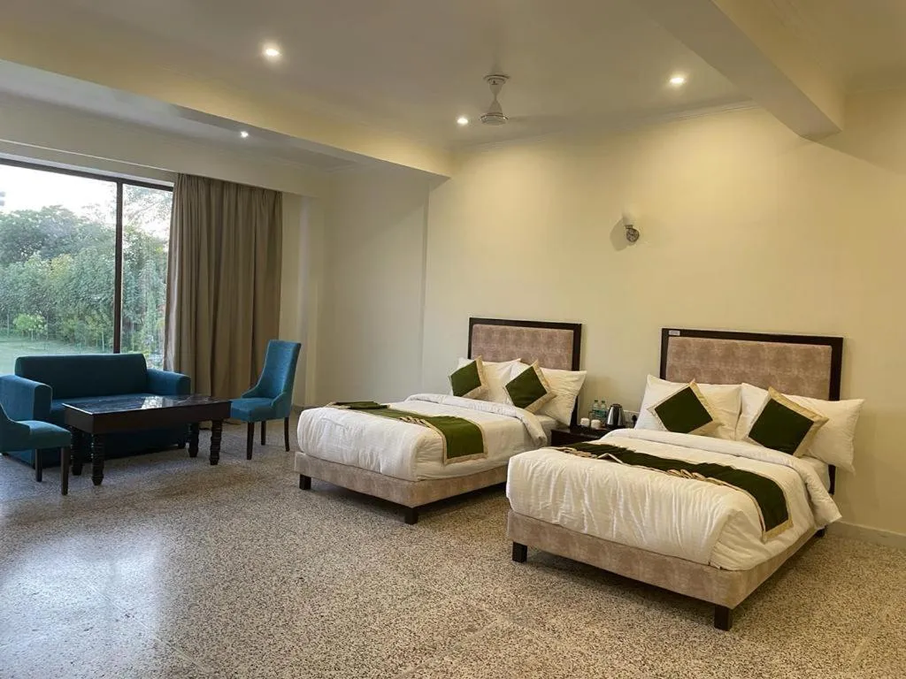 Bed in Gautam Hotels & Resorts