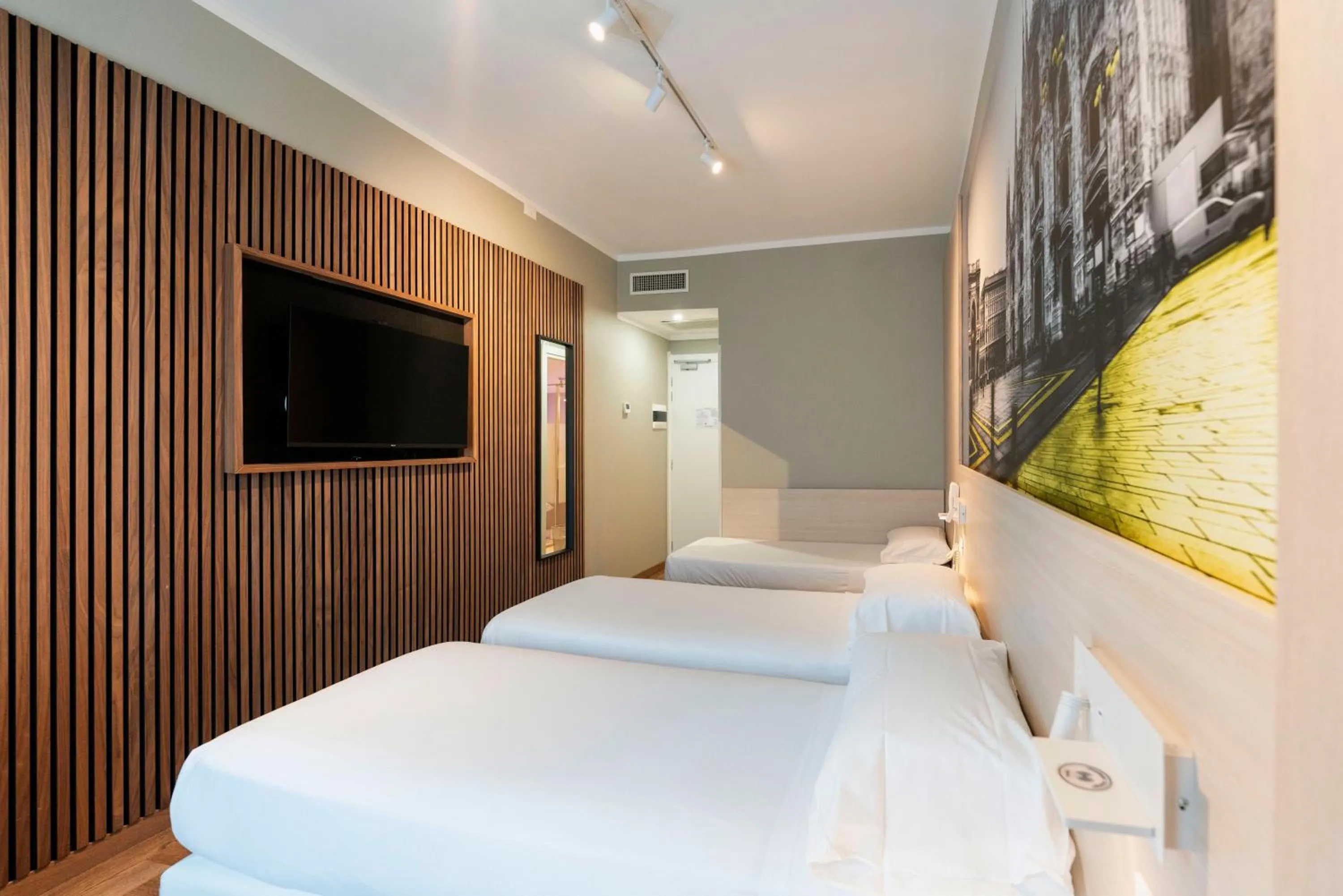 Bed in Kleos Hotel Milano Città Studi by Kleos Group Collection