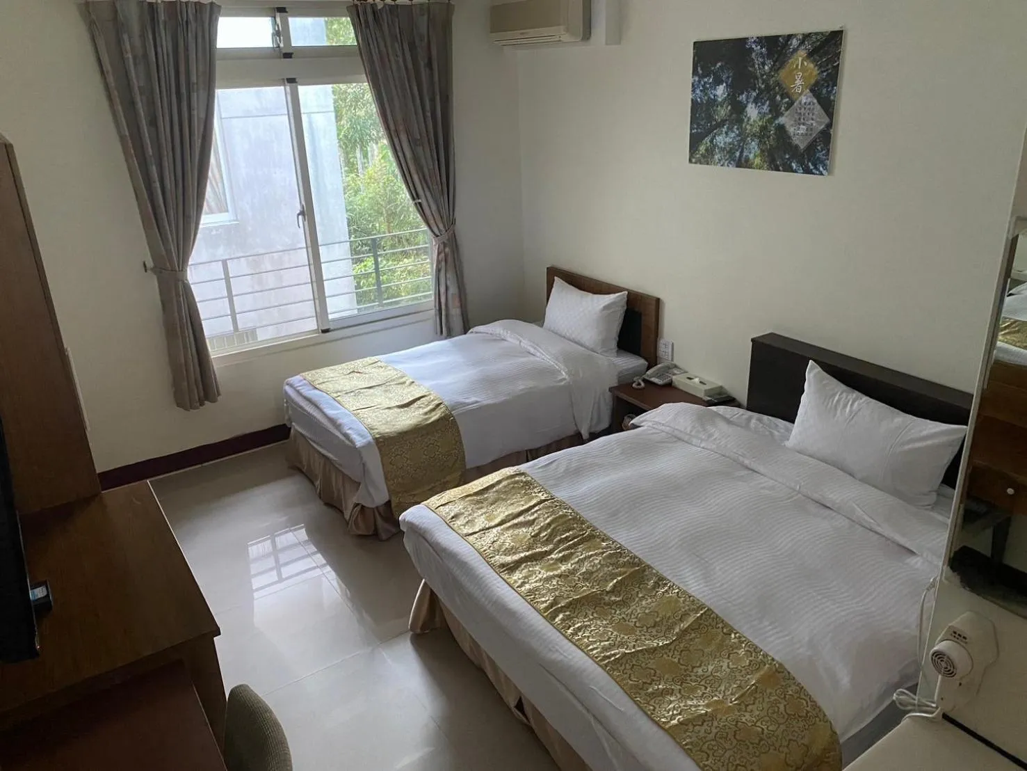 Bed in Zen and Pine Resort