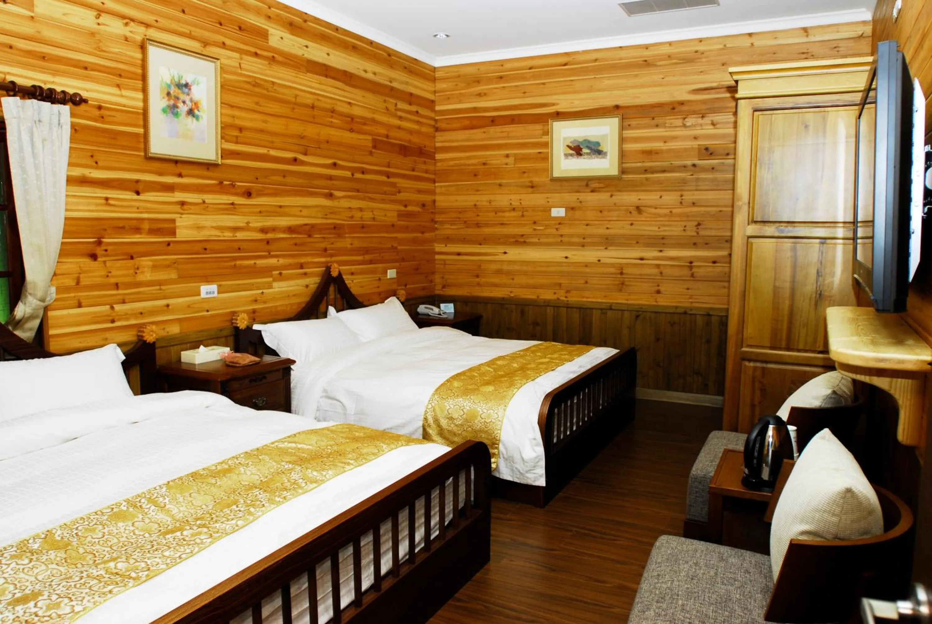 Bed in Zen and Pine Resort