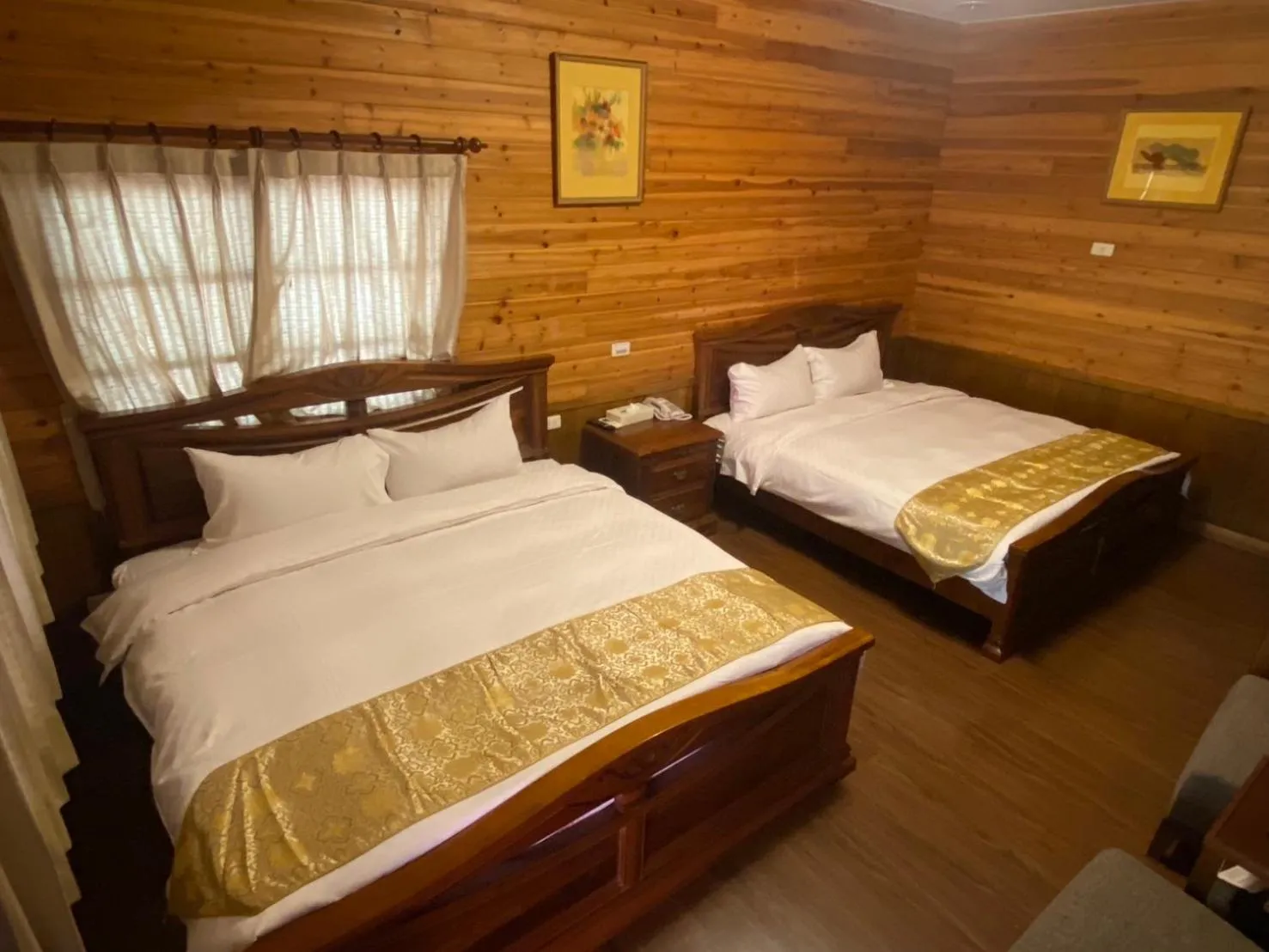 Bed in Zen and Pine Resort