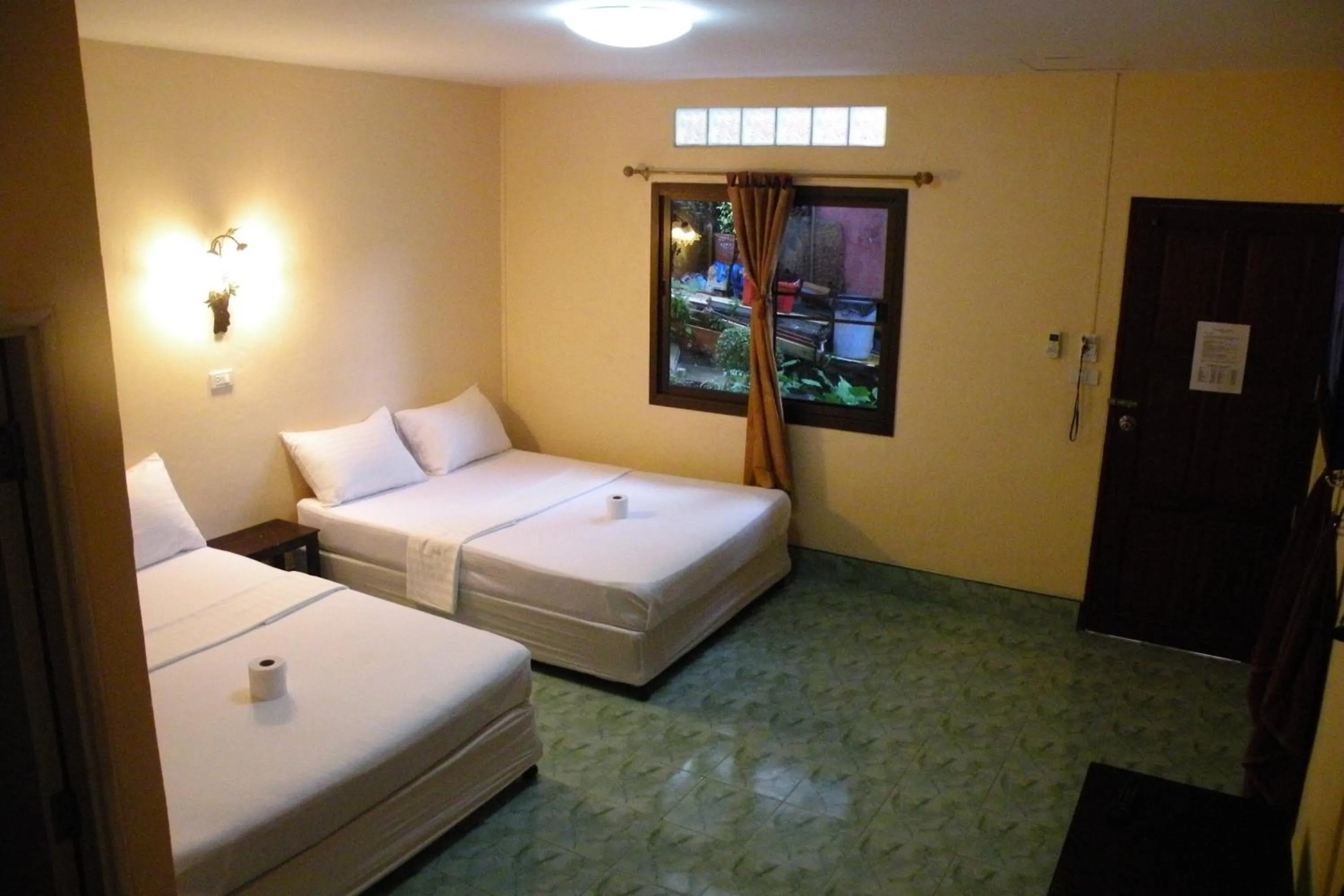 Bed in Coco's Guest House