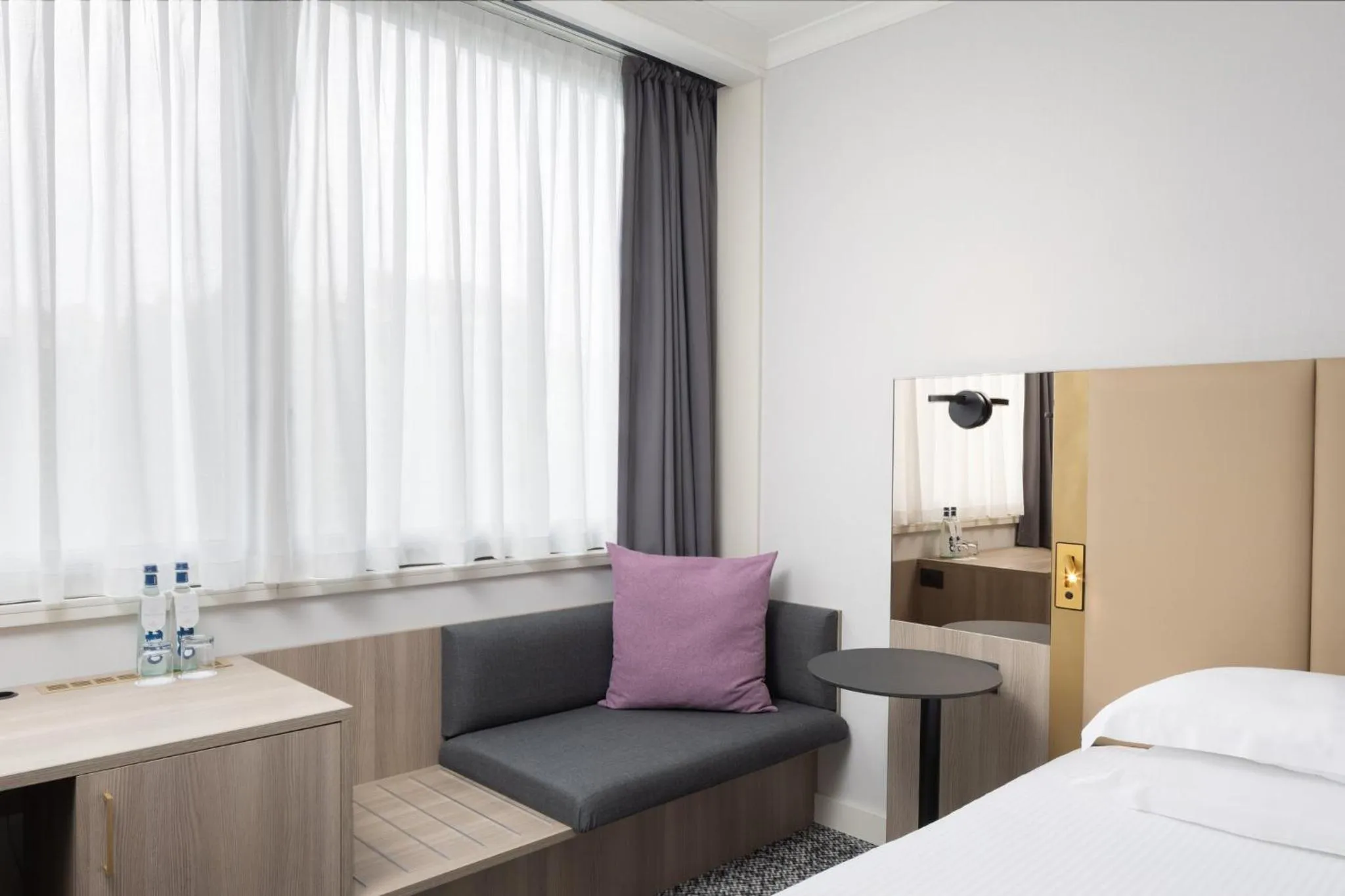 Photo of the whole room, Bed in Crowne Plaza Milan Linate by IHG