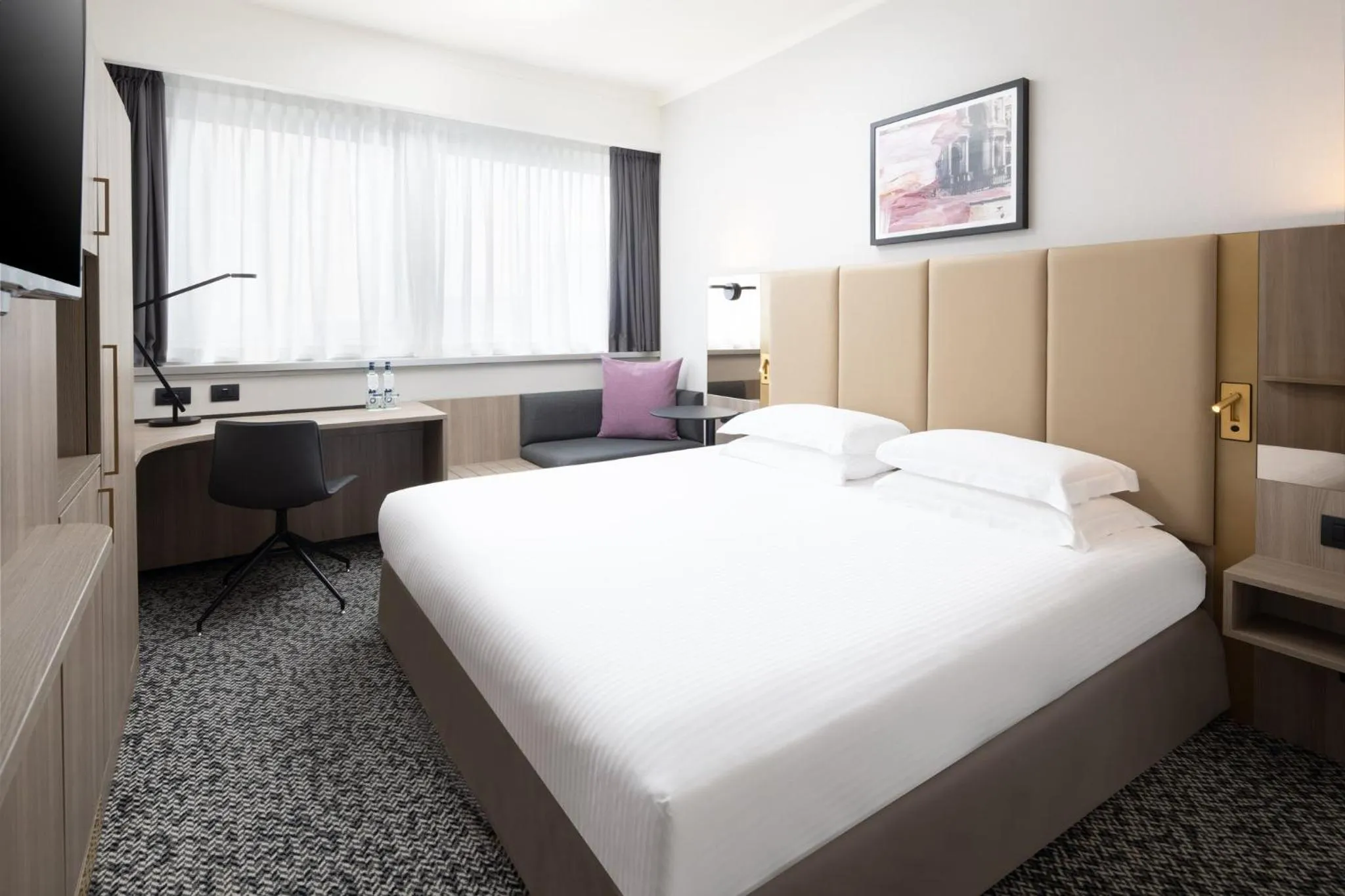 Photo of the whole room, Bed in Crowne Plaza Milan Linate by IHG