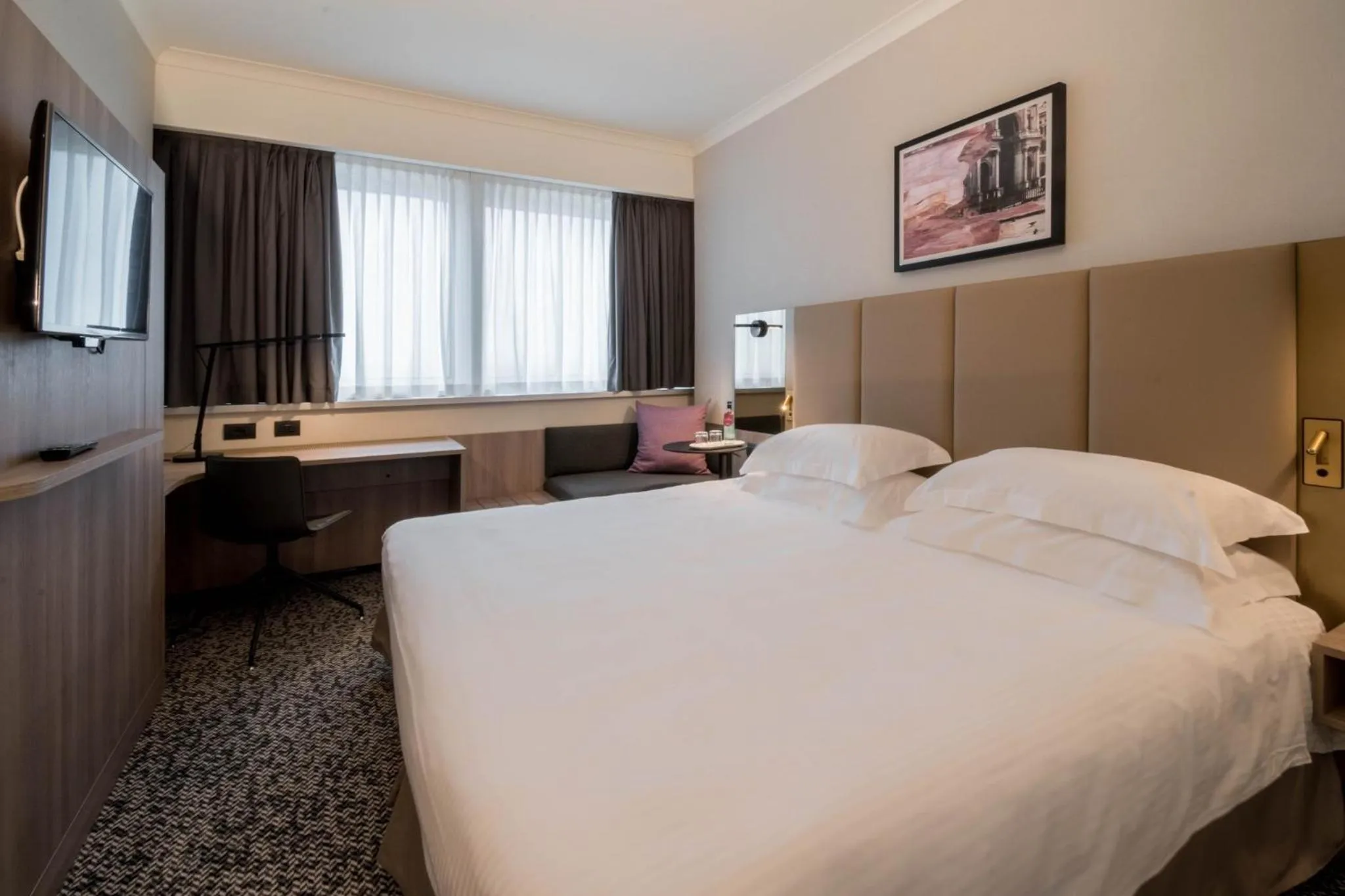 Photo of the whole room, Bed in Crowne Plaza Milan Linate by IHG