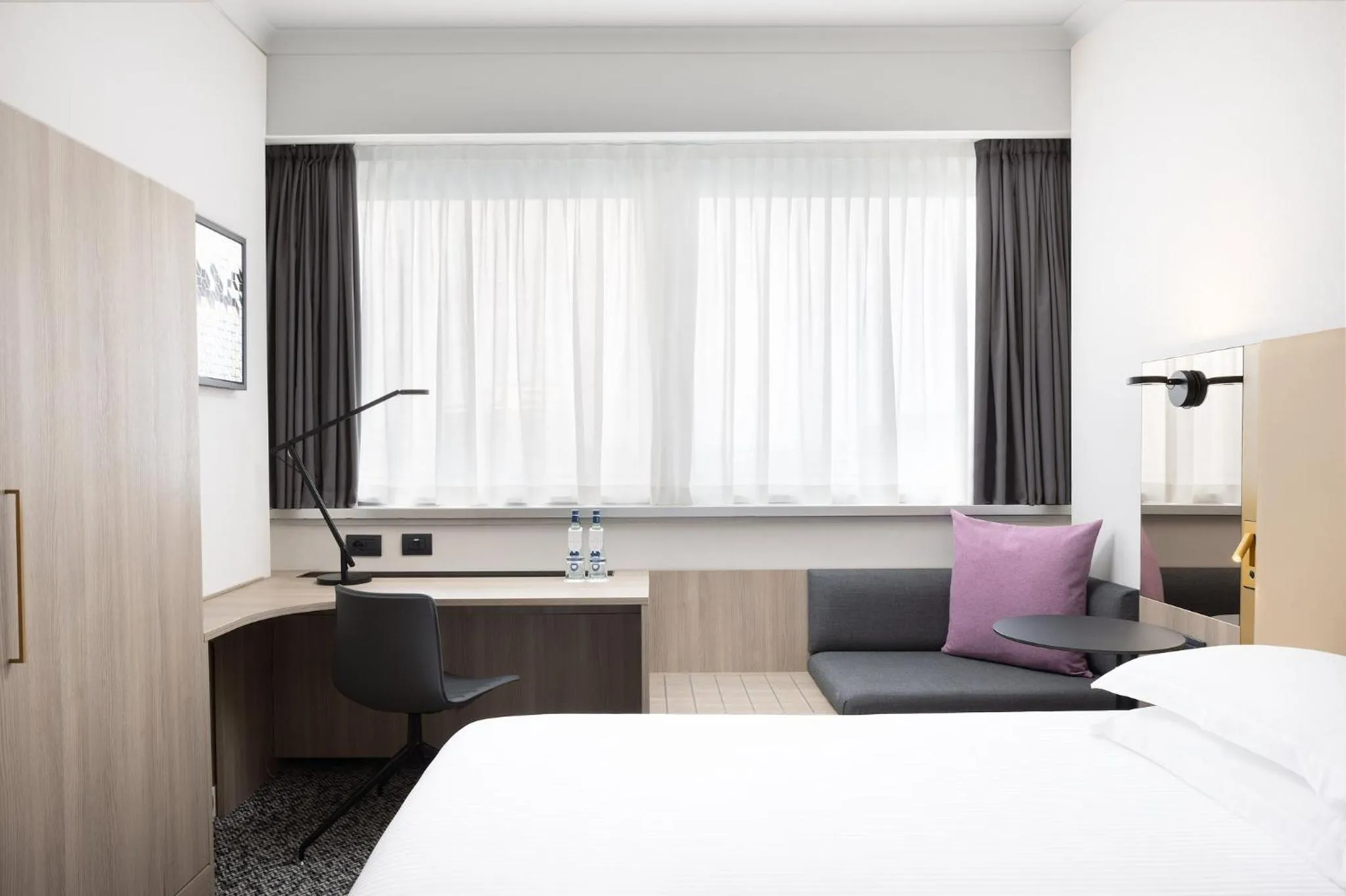 Photo of the whole room, Bed in Crowne Plaza Milan Linate by IHG