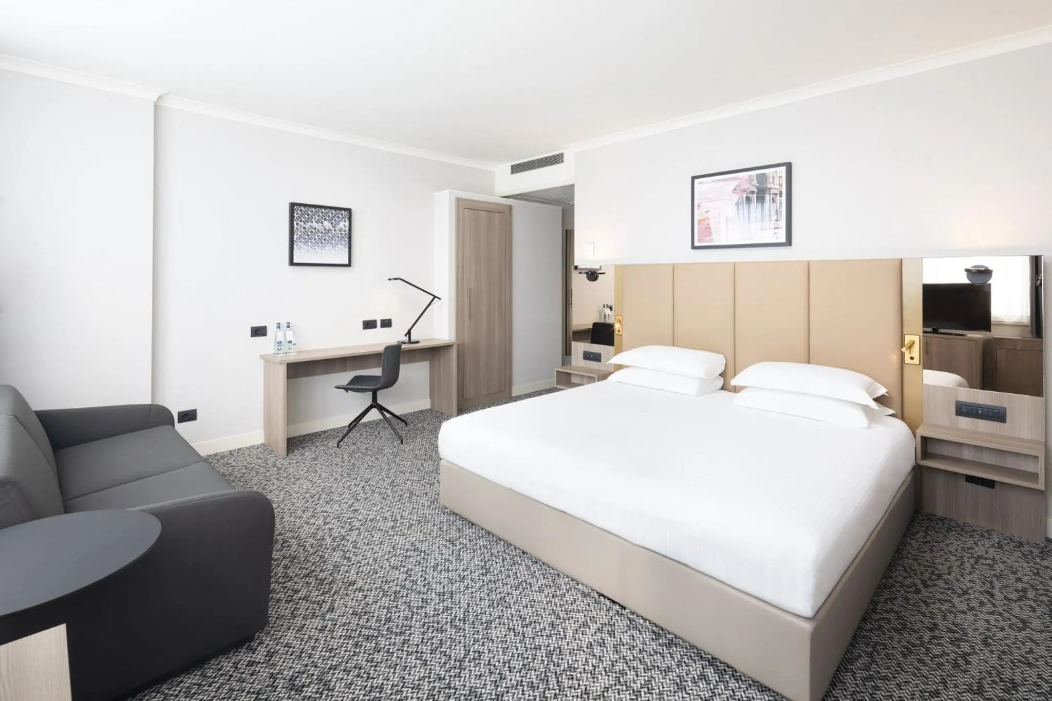 Photo of the whole room, Bed in Crowne Plaza Milan Linate by IHG