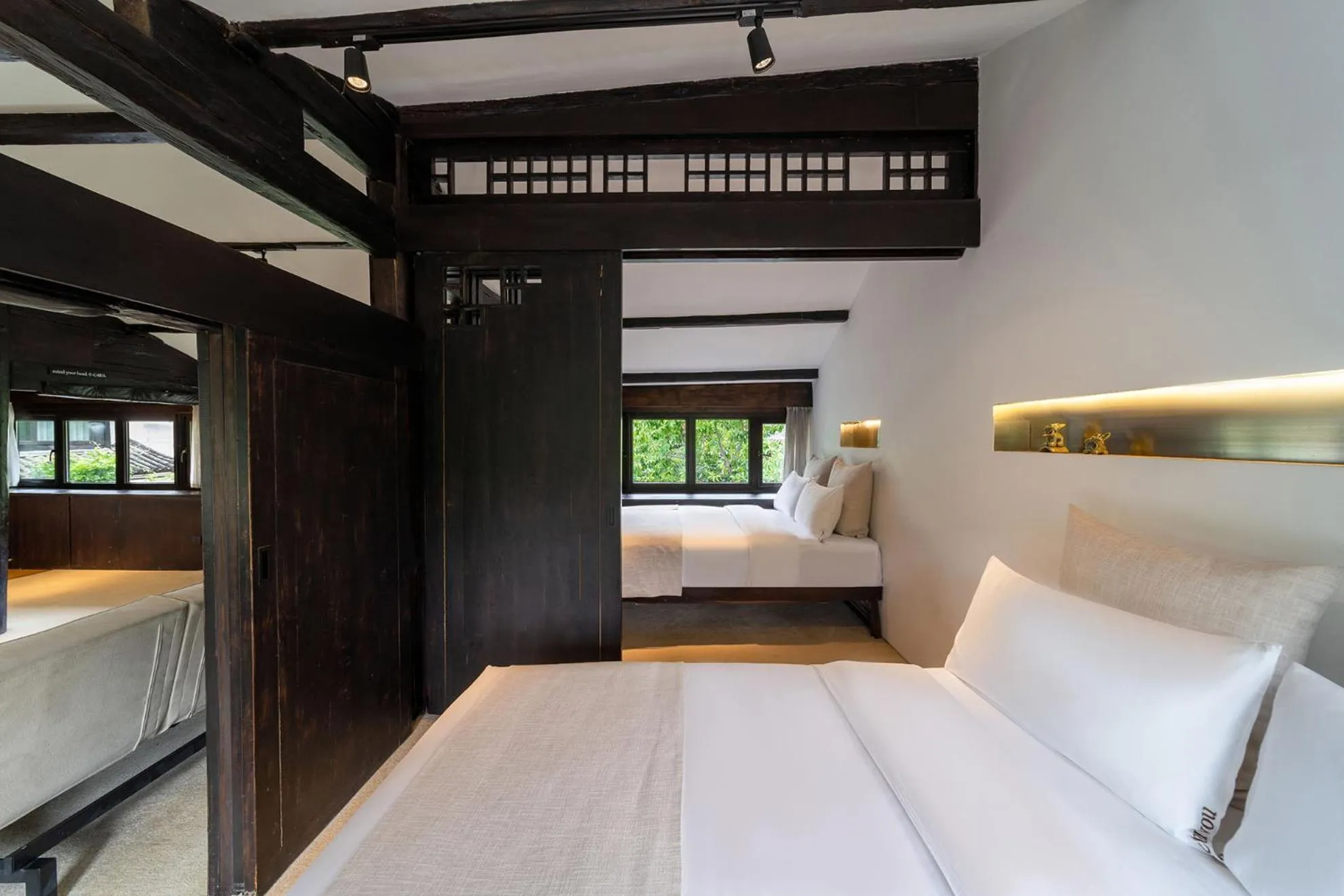 Bed in The Bivou Lijiang