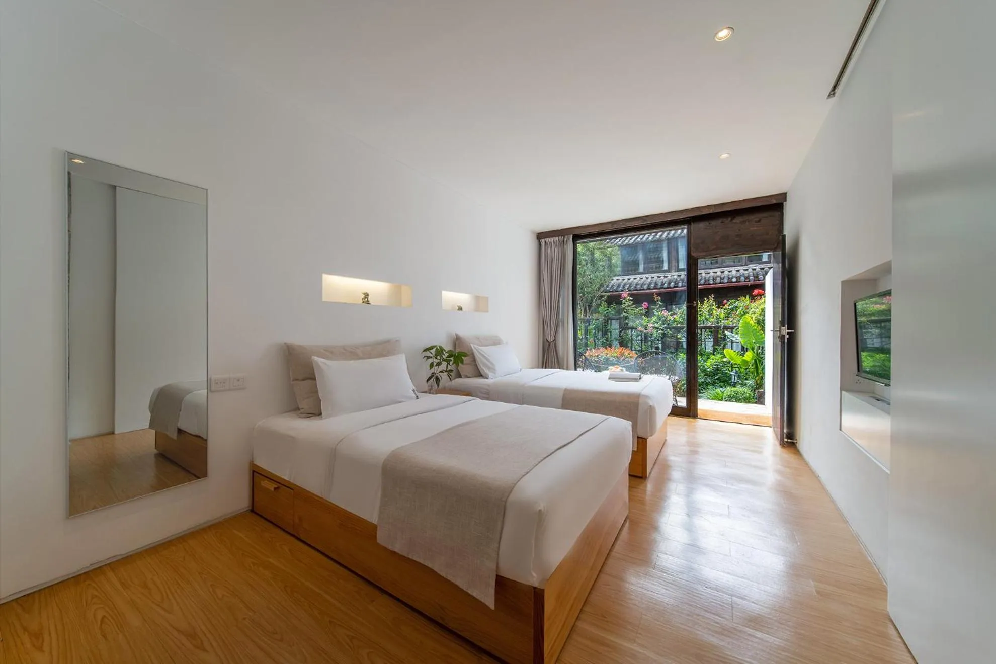 Photo of the whole room, Bed in The Bivou Lijiang