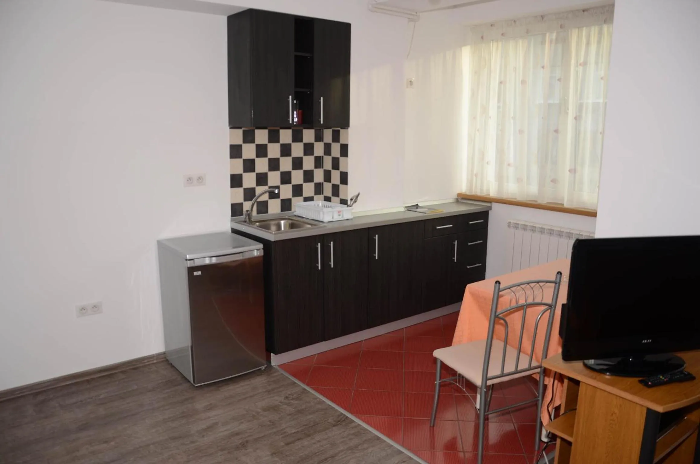 Kitchen or kitchenette in Apart La Cave