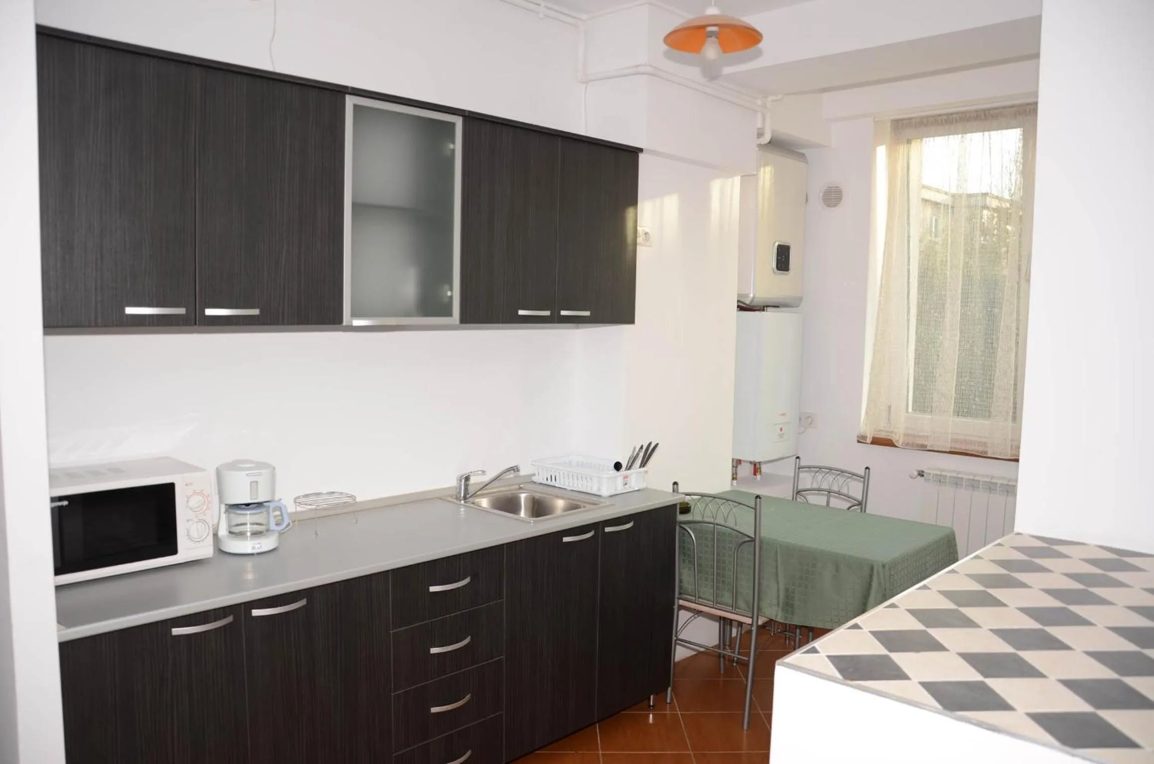 Kitchen or kitchenette in Apart La Cave