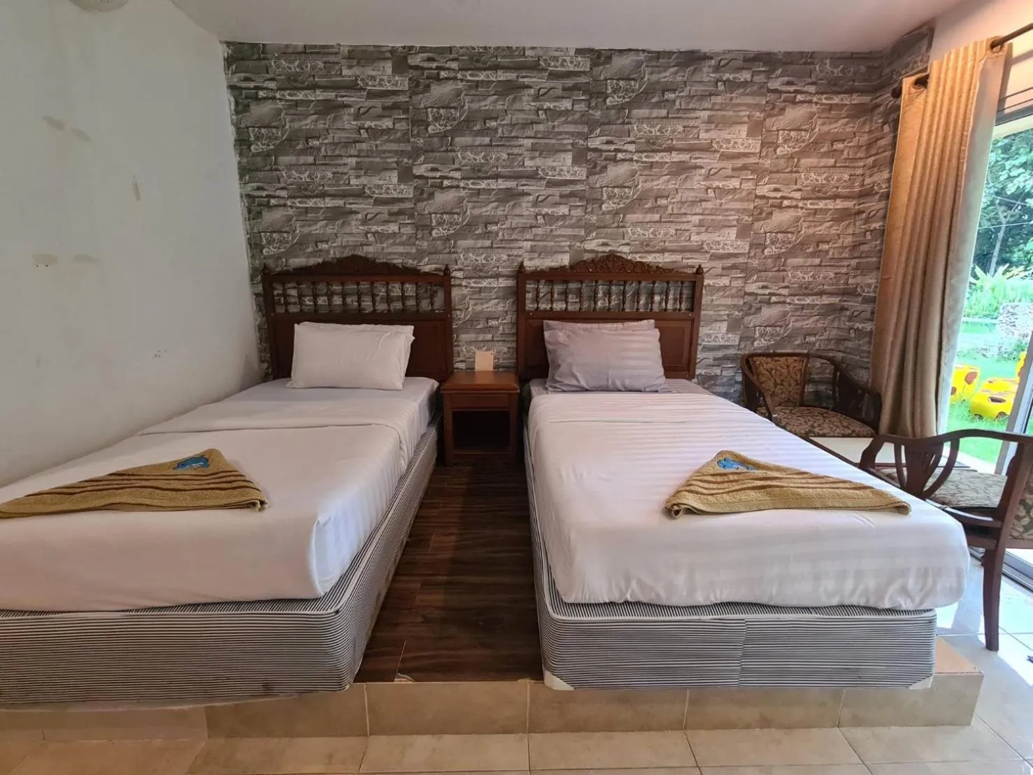 Bed in Phutawan Resort