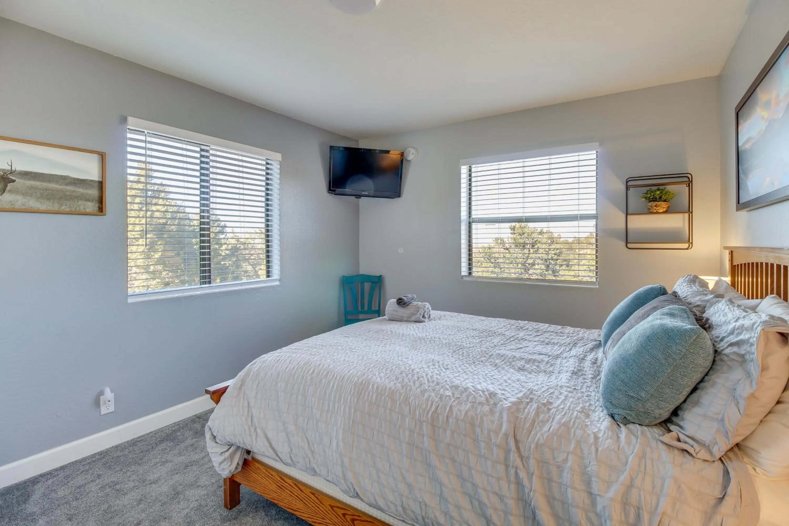 Bed in Eagar Vacation Rental Home with Spacious Deck!