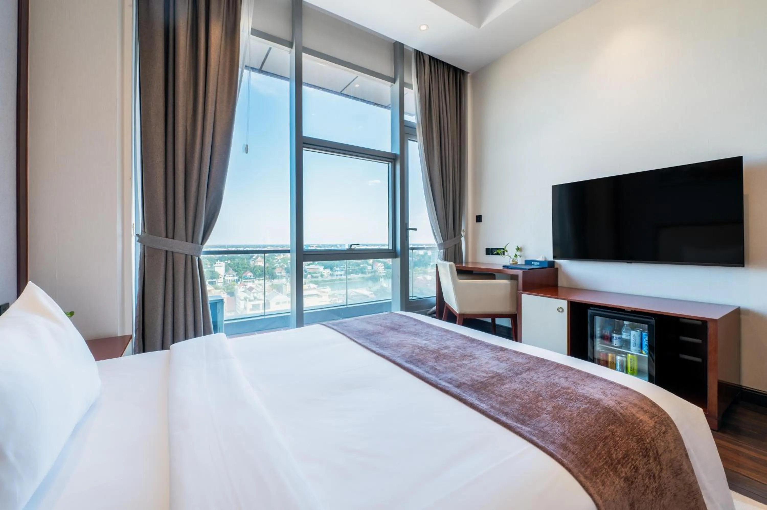 Bed in V V Hotel Battambang