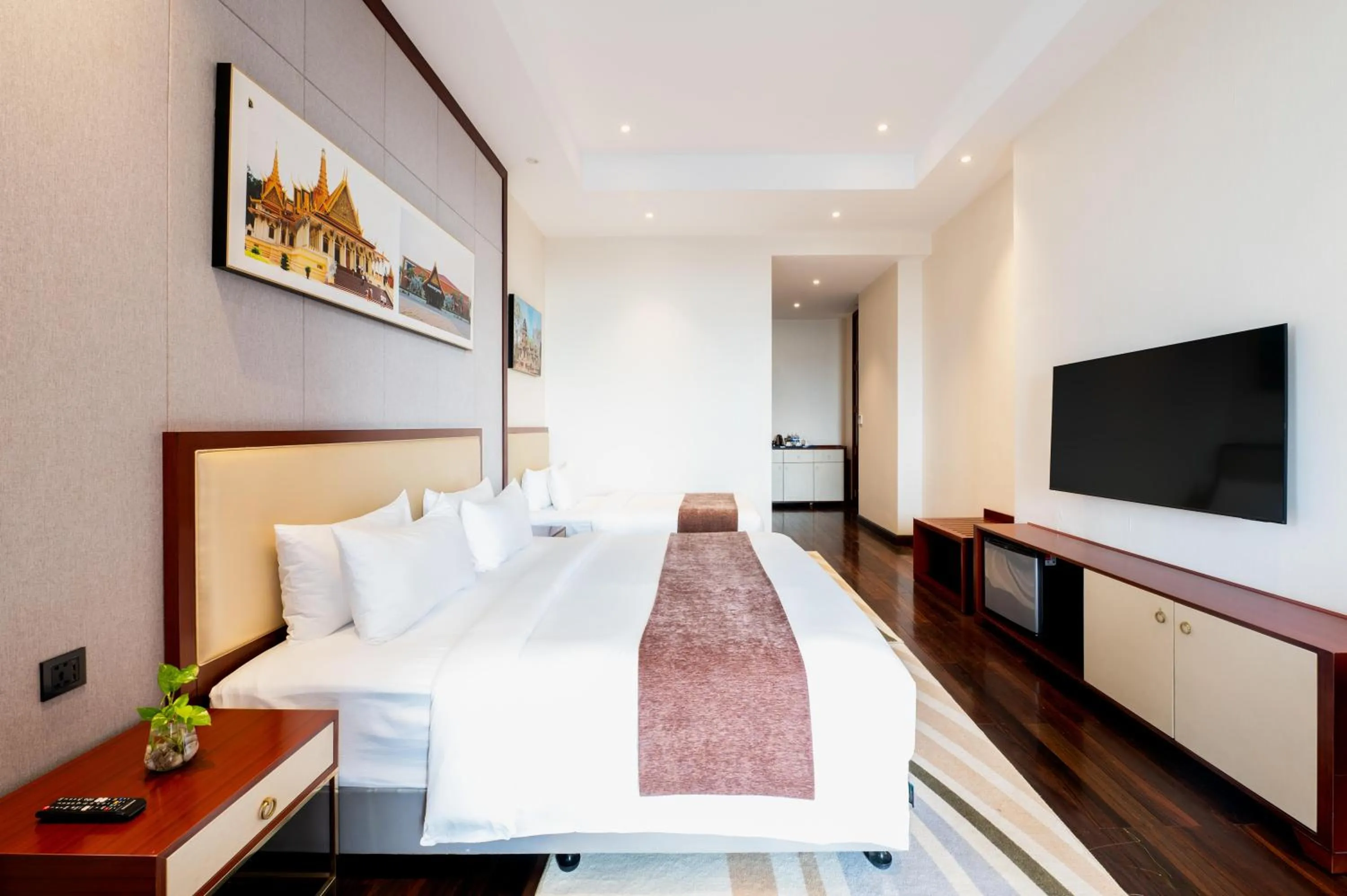 Bed in V V Hotel Battambang