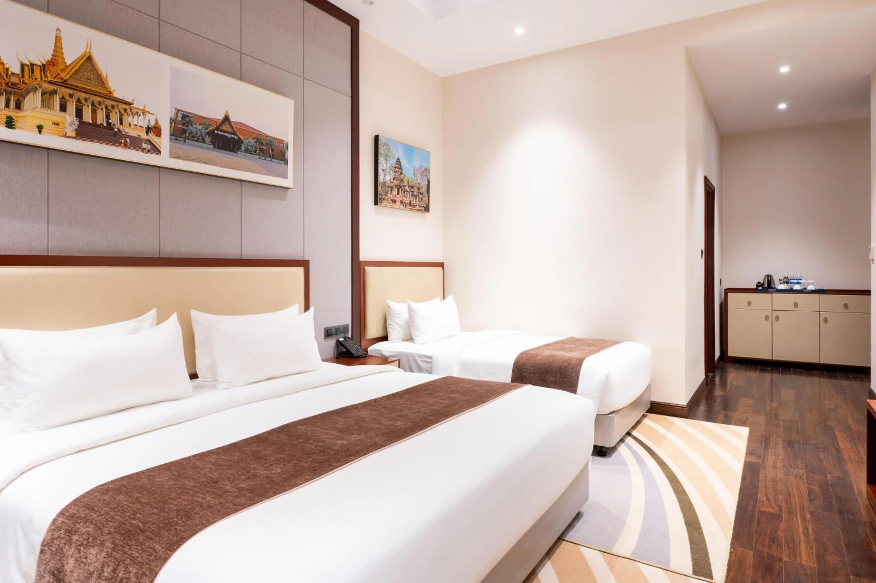 Bed in V V Hotel Battambang