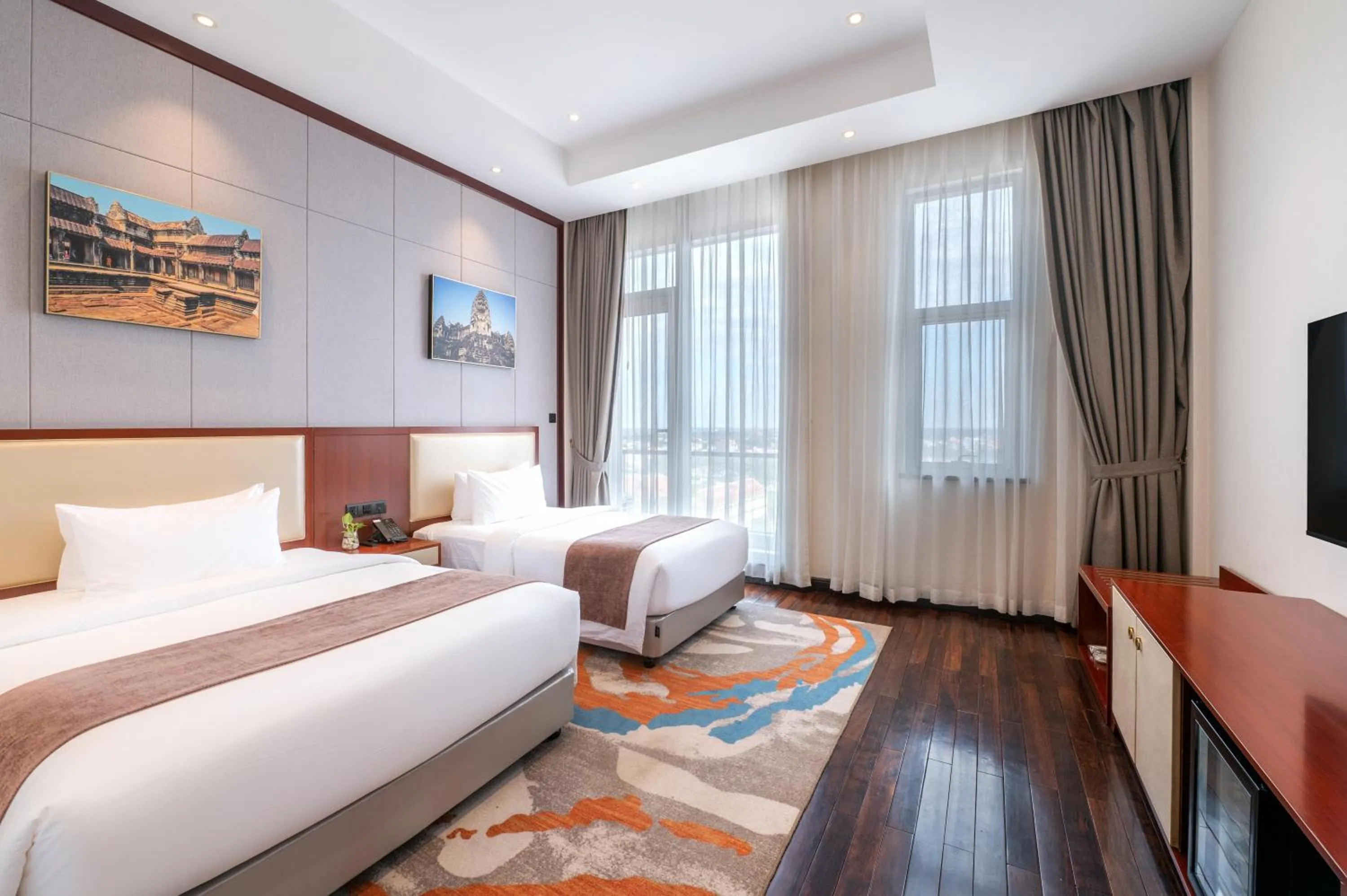 Bed in V V Hotel Battambang